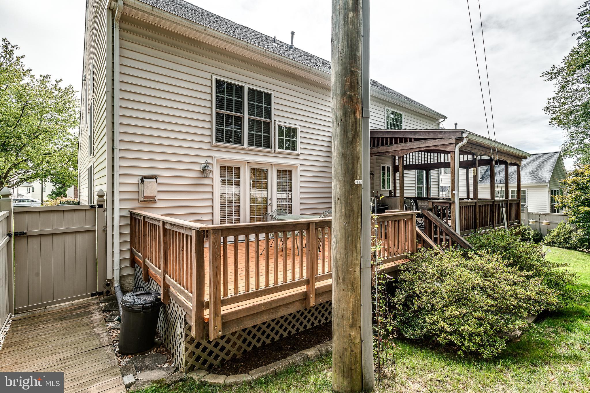 687 Hunters Road Culpeper, VA 22701 - Photo 39 of 57 a view of a house with wooden deck front of house