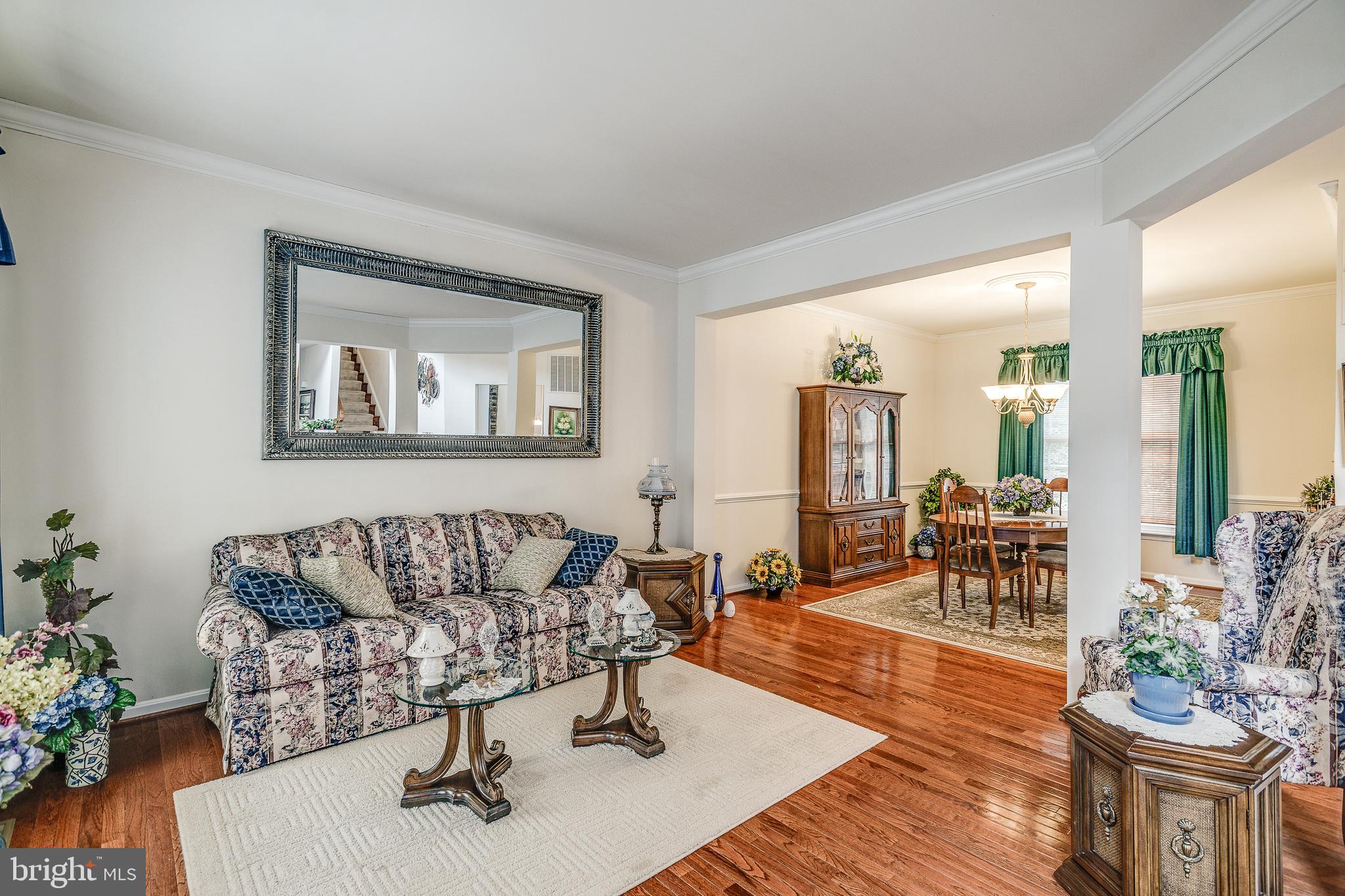 687 Hunters Road Culpeper, VA 22701 - Photo 5 of 57 a living room with furniture and wooden floor