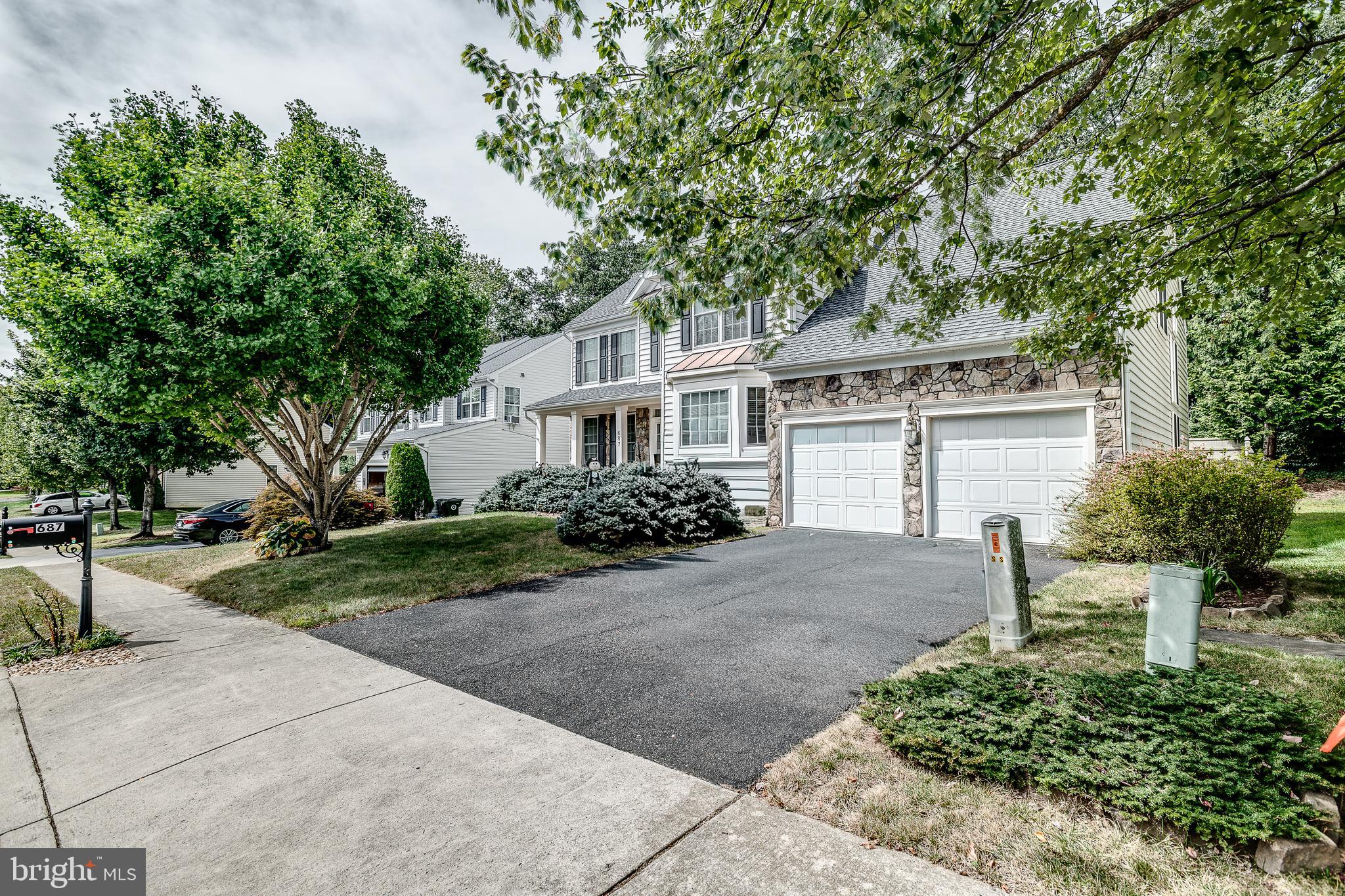 687 Hunters Road Culpeper, VA 22701 - Photo 51 of 57 a front view of a house with a garden