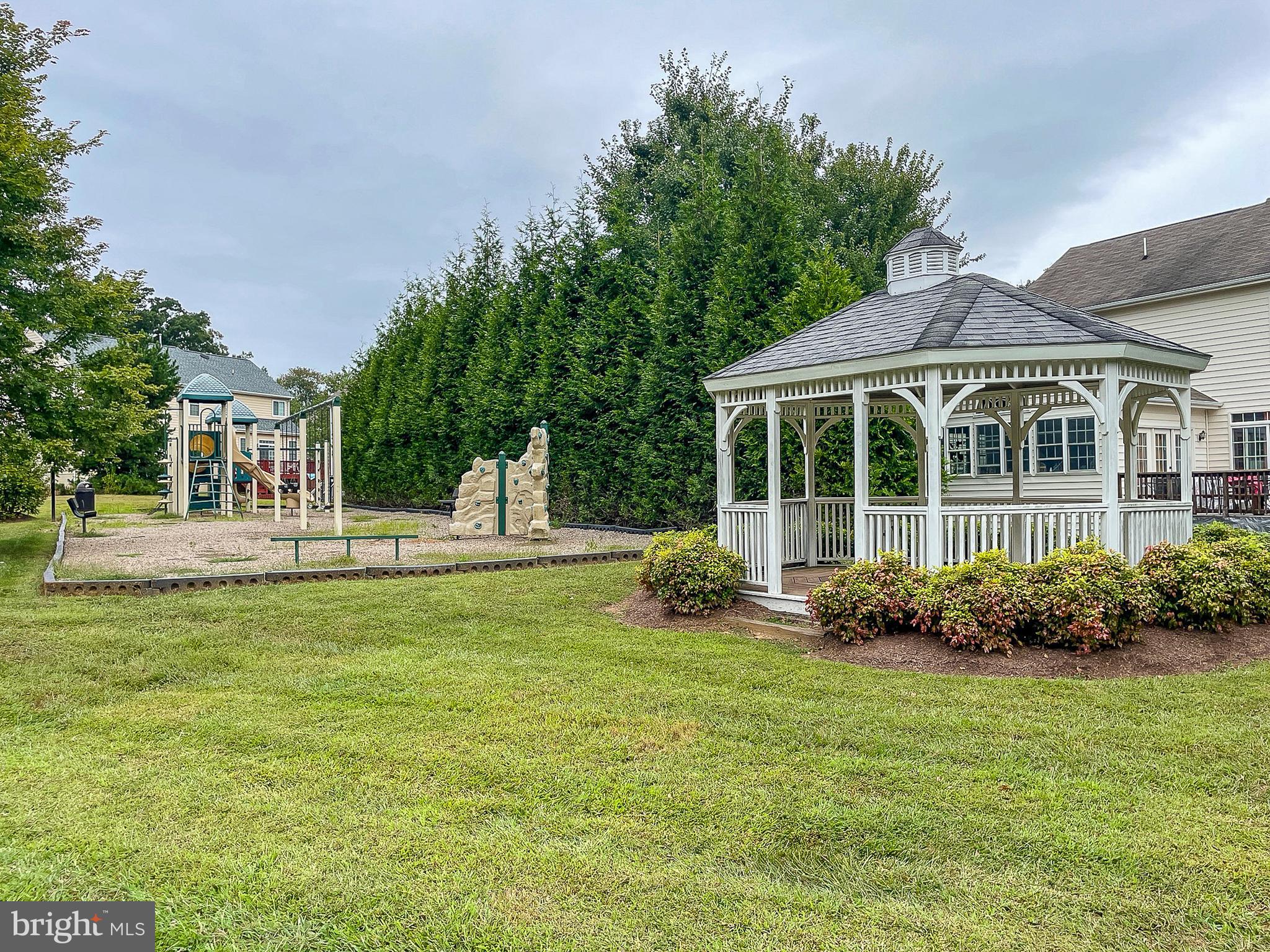 687 Hunters Road Culpeper, VA 22701 - Photo 54 of 57 a front view of a house with a garden