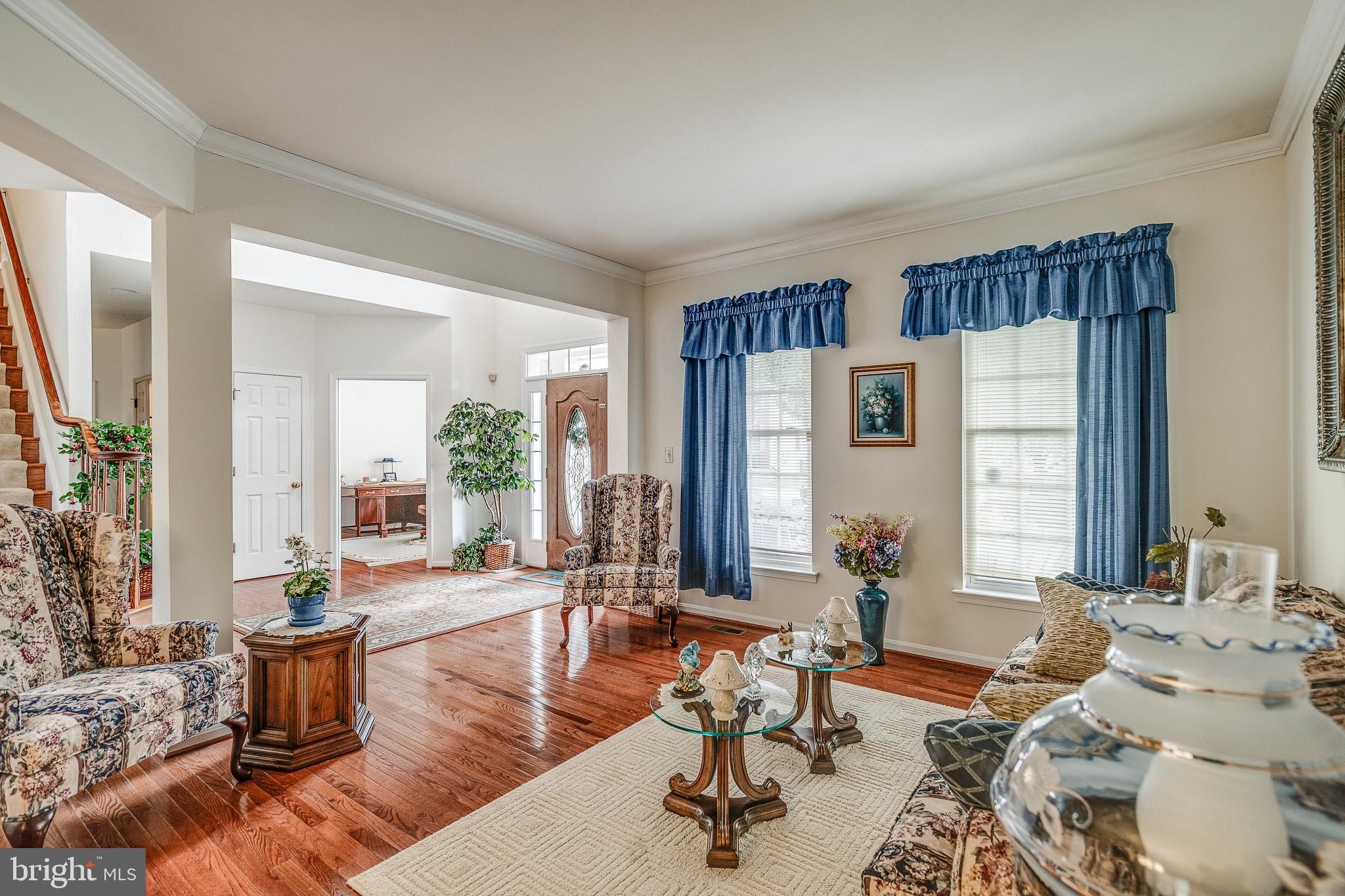 687 Hunters Road Culpeper, VA 22701 - Photo 6 of 57 a living room with furniture and large windows