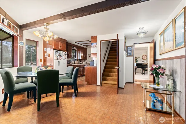 a view of a dining room with furniture