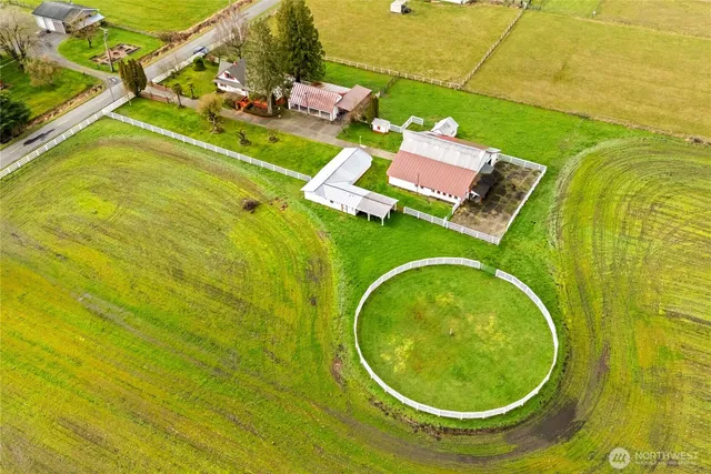 a aerial view of a house with a swimming pool