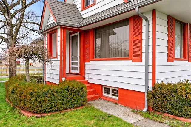 a view of swimming pool with a garden and seating area