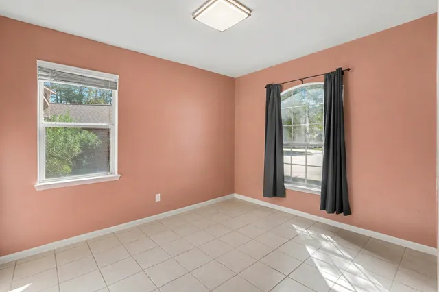 an empty room with windows