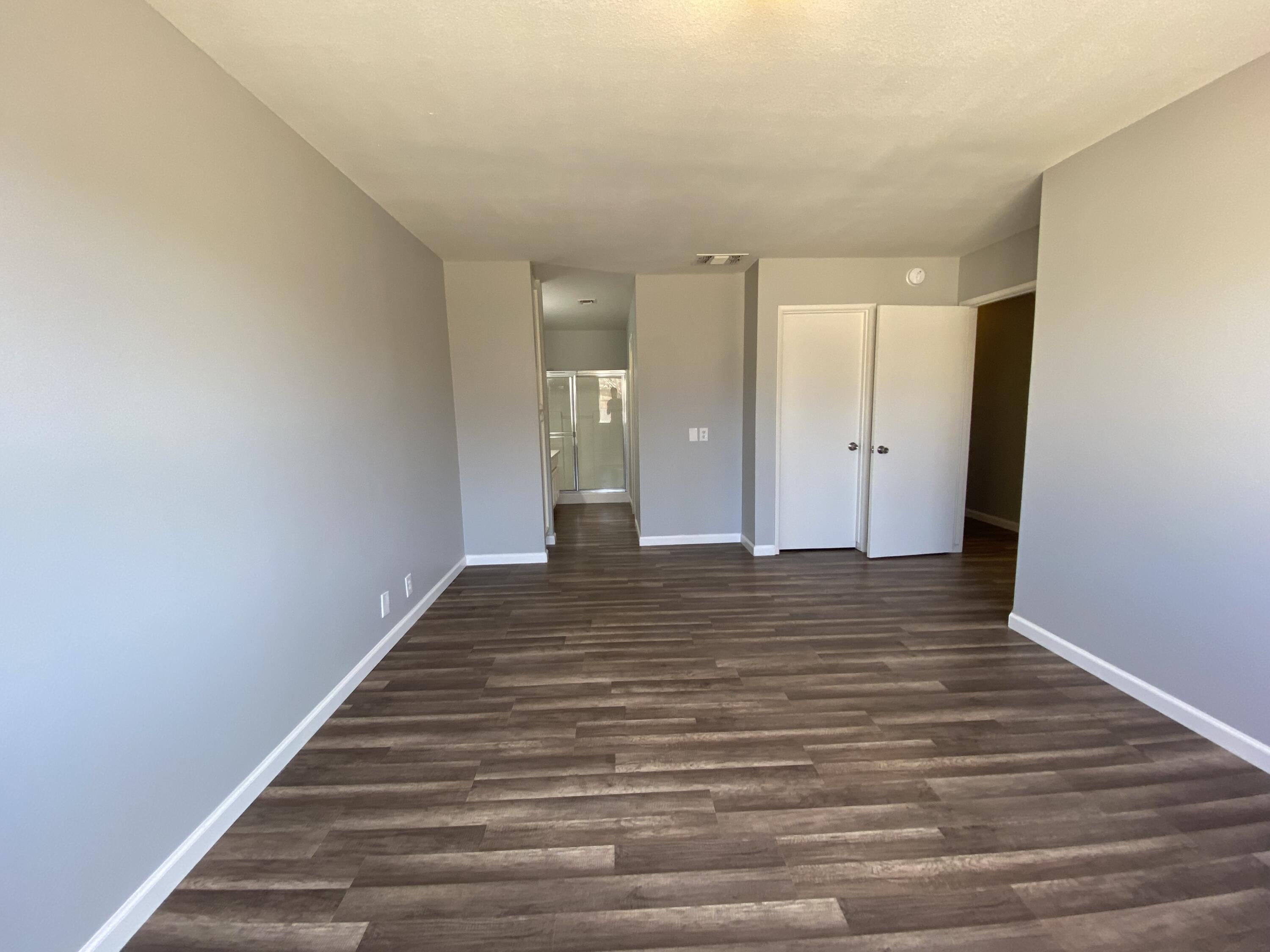 1241 South Ranger Street Ridgecrest, CA 93555 - Photo 16 of 26 a view of a room with wooden floor