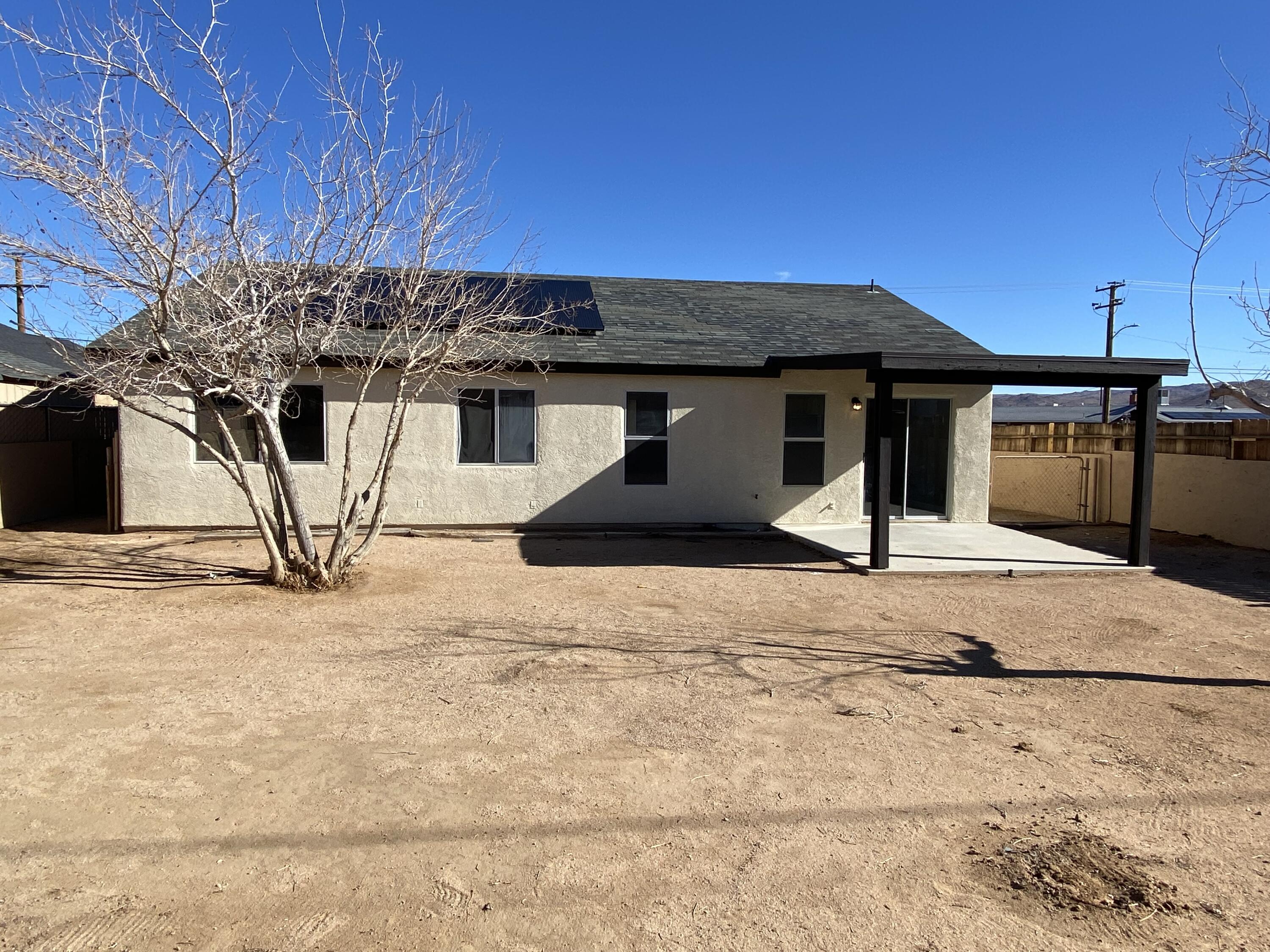 1241 South Ranger Street Ridgecrest, CA 93555 - Photo 25 of 26 a view of a house with a snow
