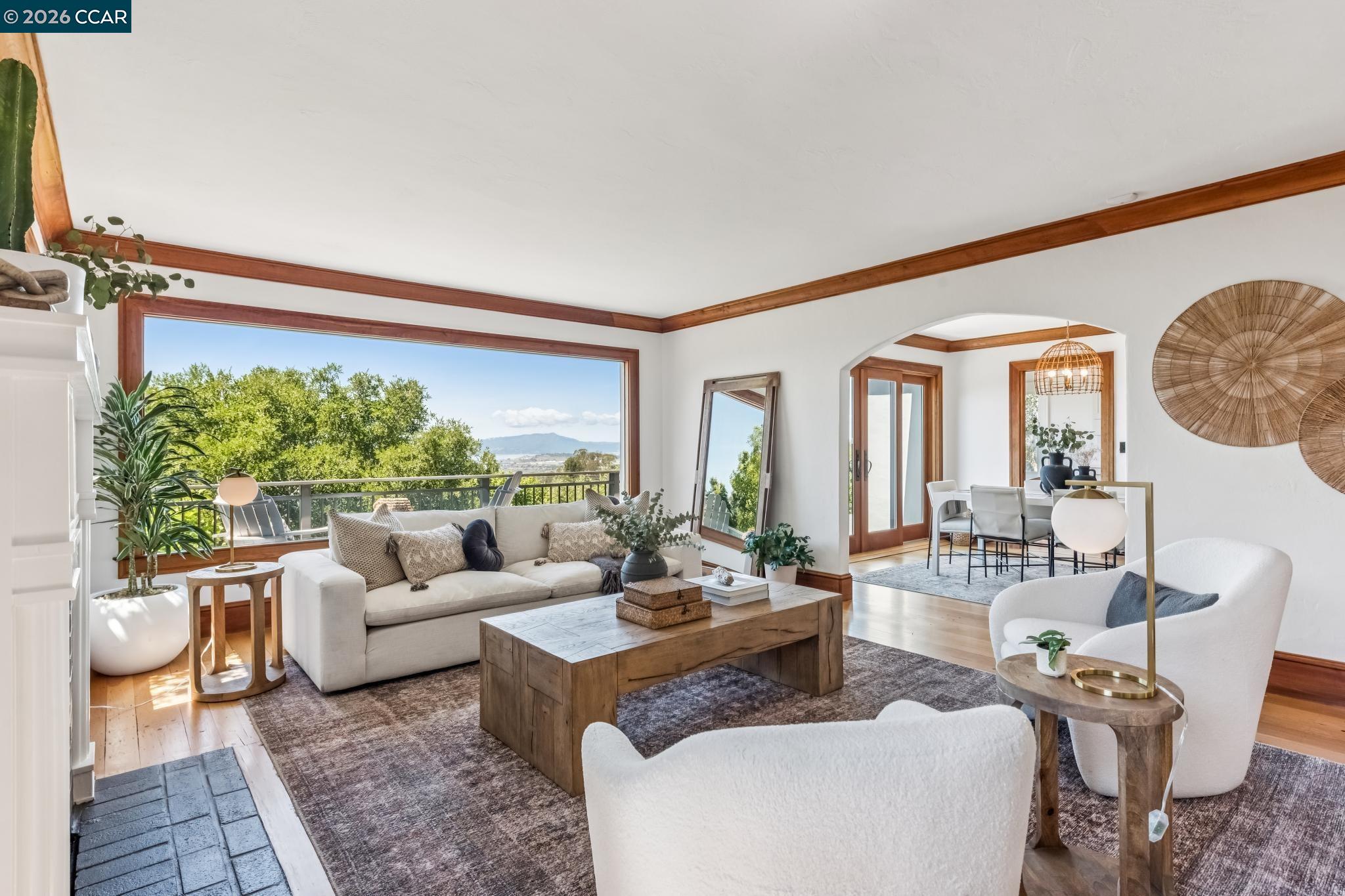 212 Yale Avenue Kensington, CA 94708 - Photo 11 of 70 a living room with furniture and a large window