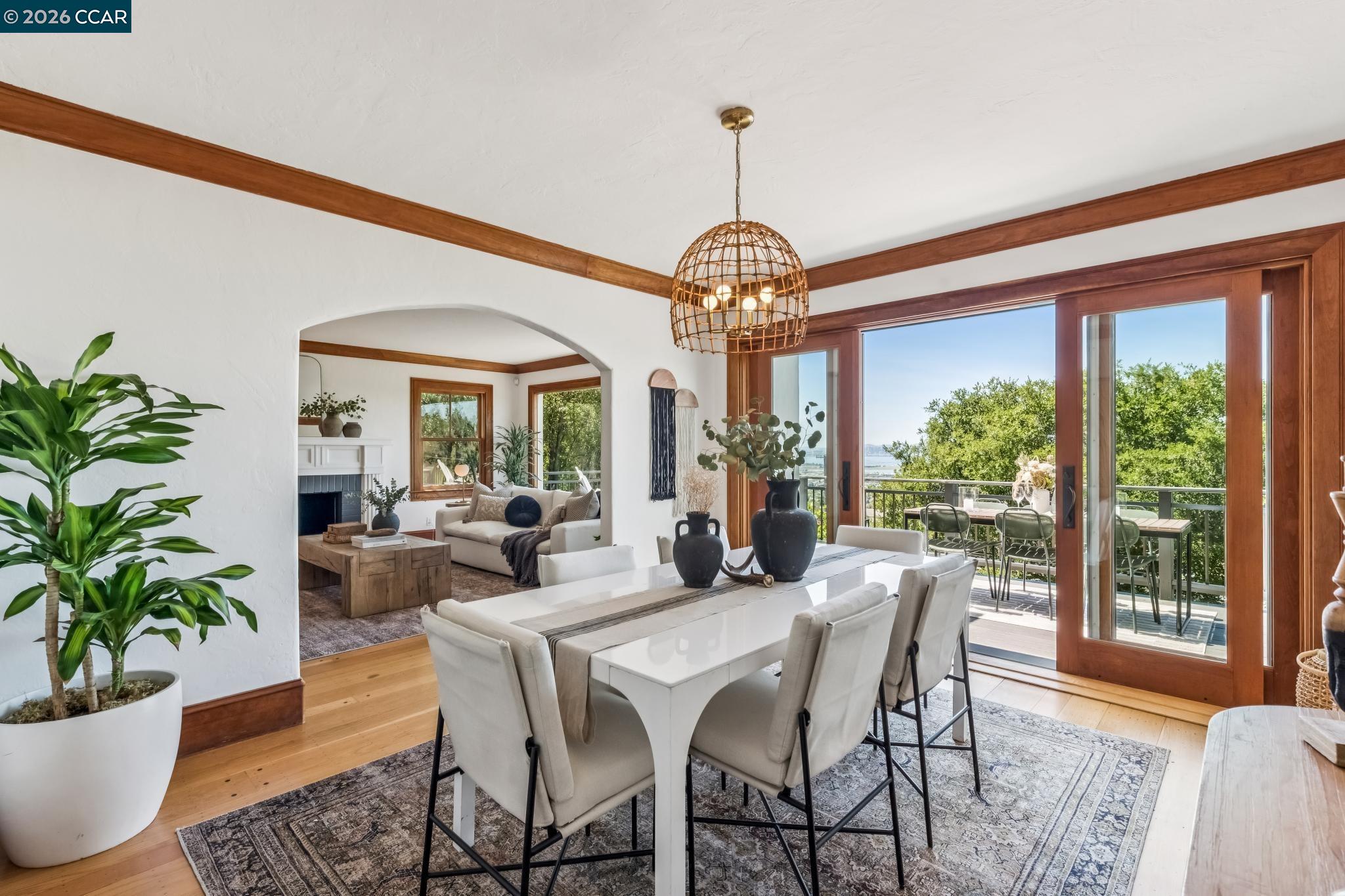 212 Yale Avenue Kensington, CA 94708 - Photo 15 of 70 a view of a dining room with furniture window and wooden floor