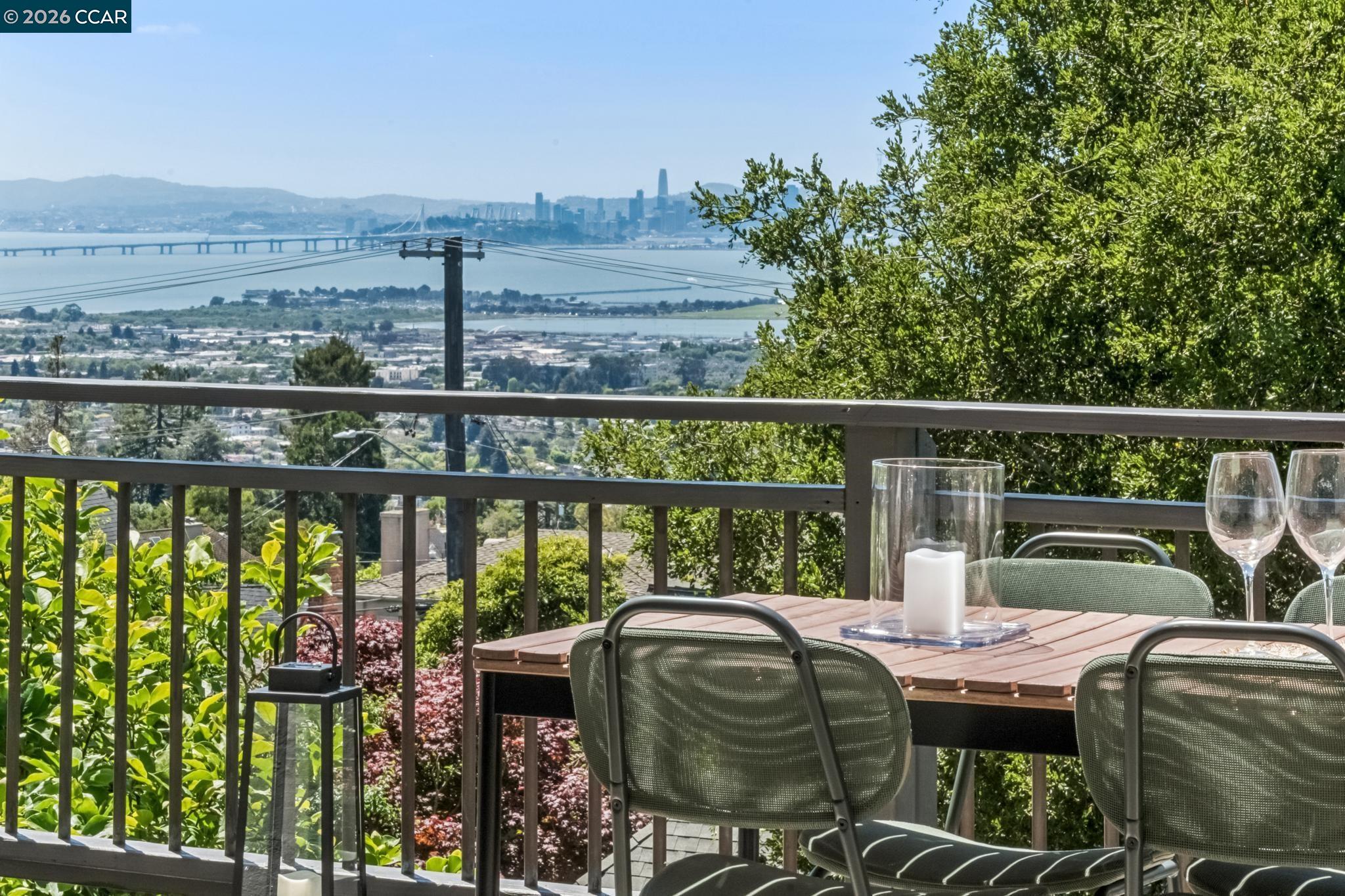 212 Yale Avenue Kensington, CA 94708 - Photo 17 of 70 a balcony with couple of chairs and a potted plant