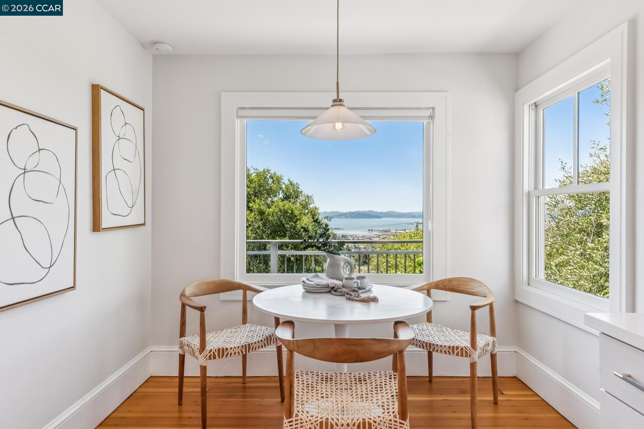212 Yale Avenue Kensington, CA 94708 - Photo 26 of 70 a view of a dining room with furniture window and wooden floor