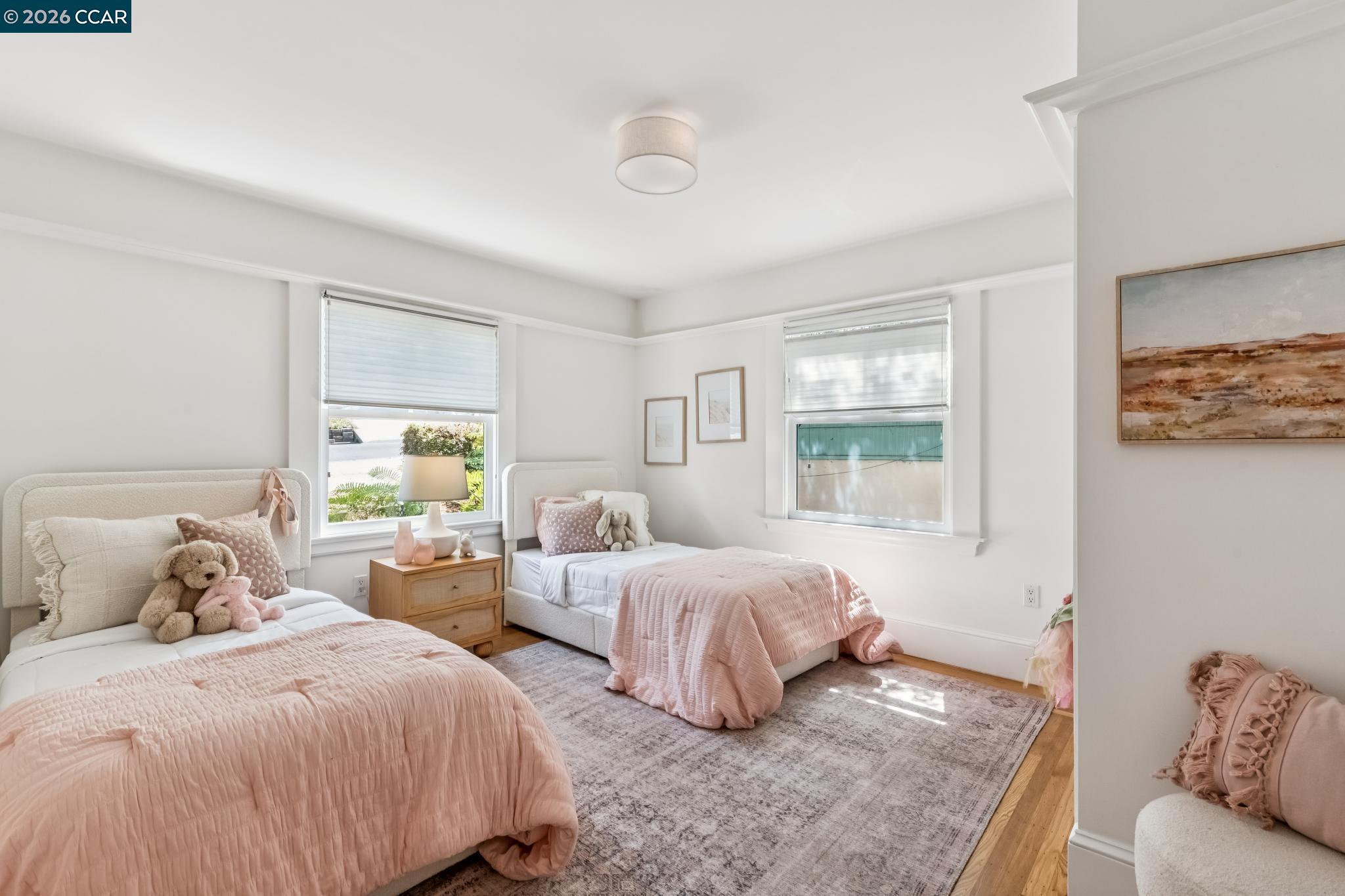 212 Yale Avenue Kensington, CA 94708 - Photo 27 of 70 a bedroom with two beds and large window