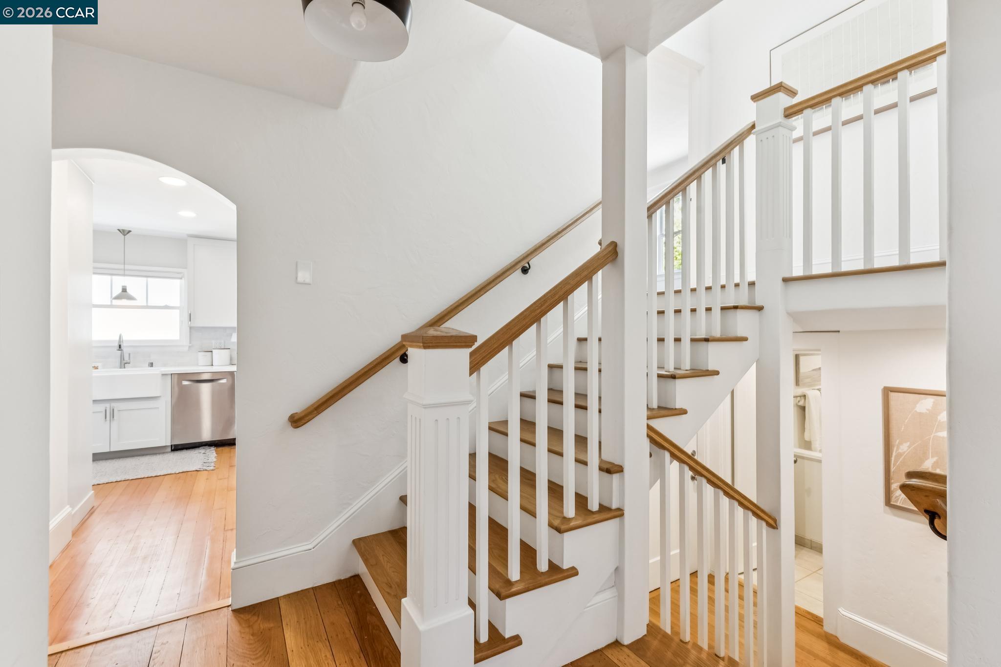 212 Yale Avenue Kensington, CA 94708 - Photo 30 of 70 a view of entryway with wooden floor and stair