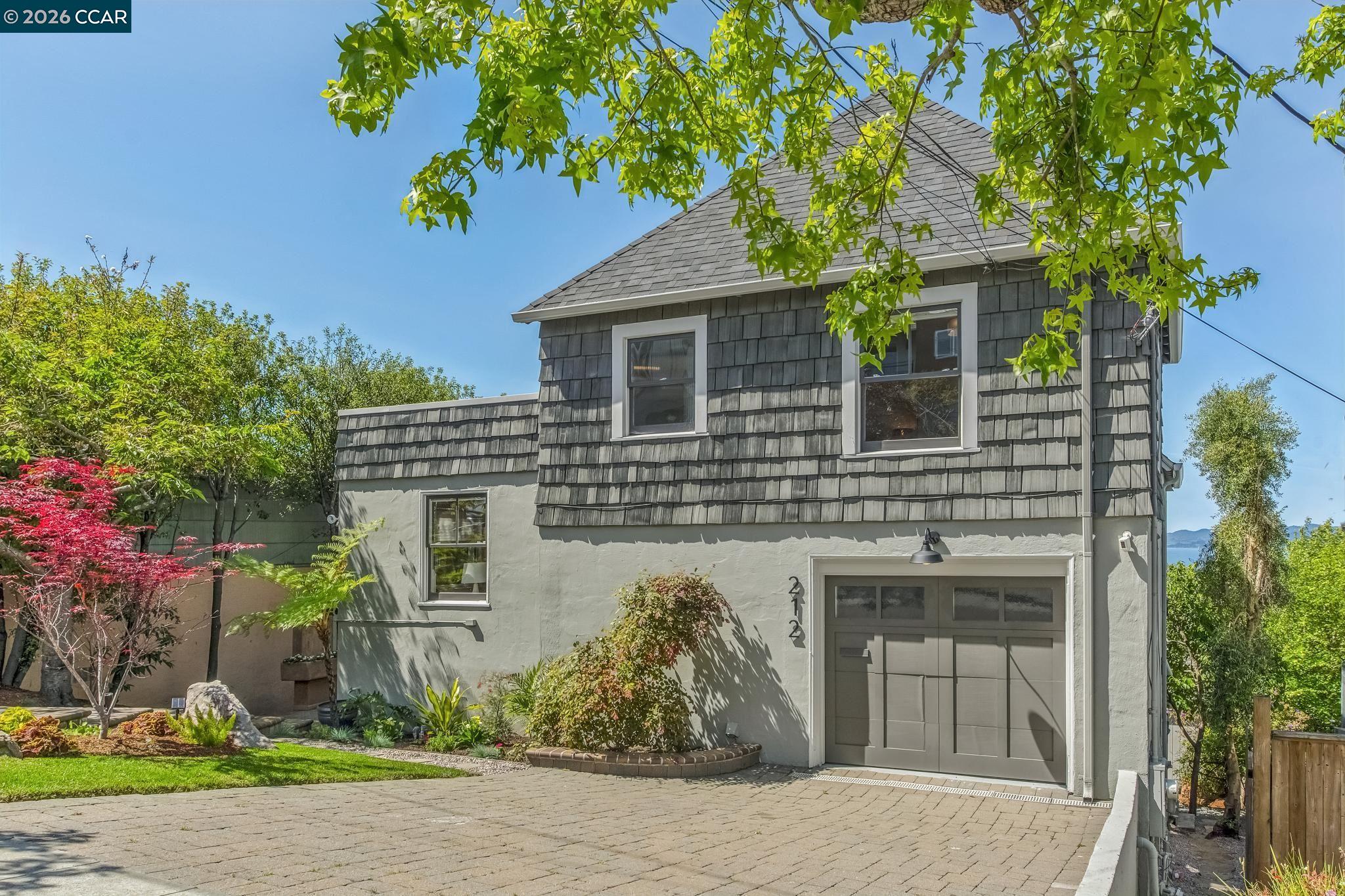 212 Yale Avenue Kensington, CA 94708 - Photo 3 of 70 a front view of a house with a yard
