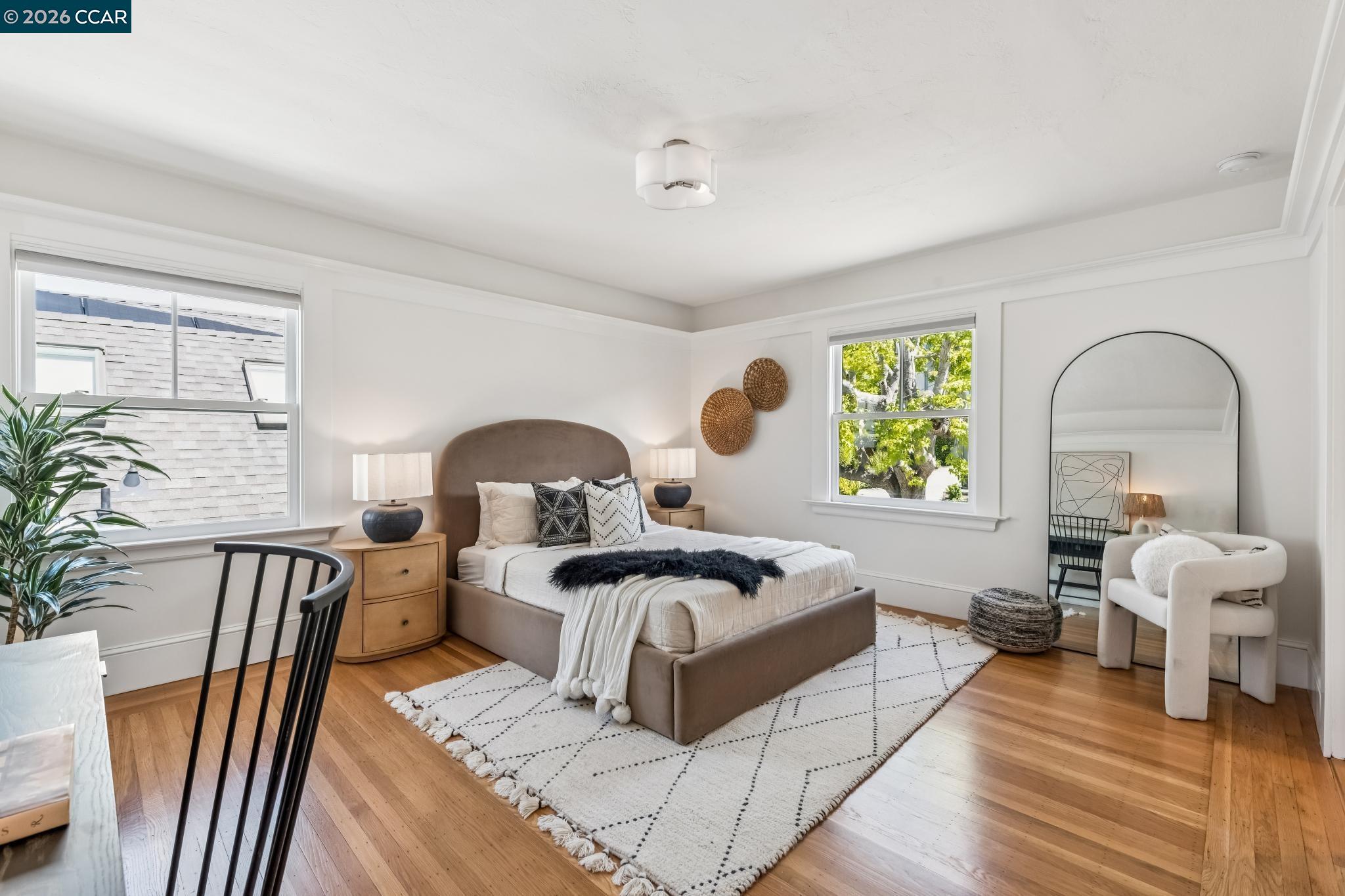 212 Yale Avenue Kensington, CA 94708 - Photo 31 of 70 a living room with furniture and a large window