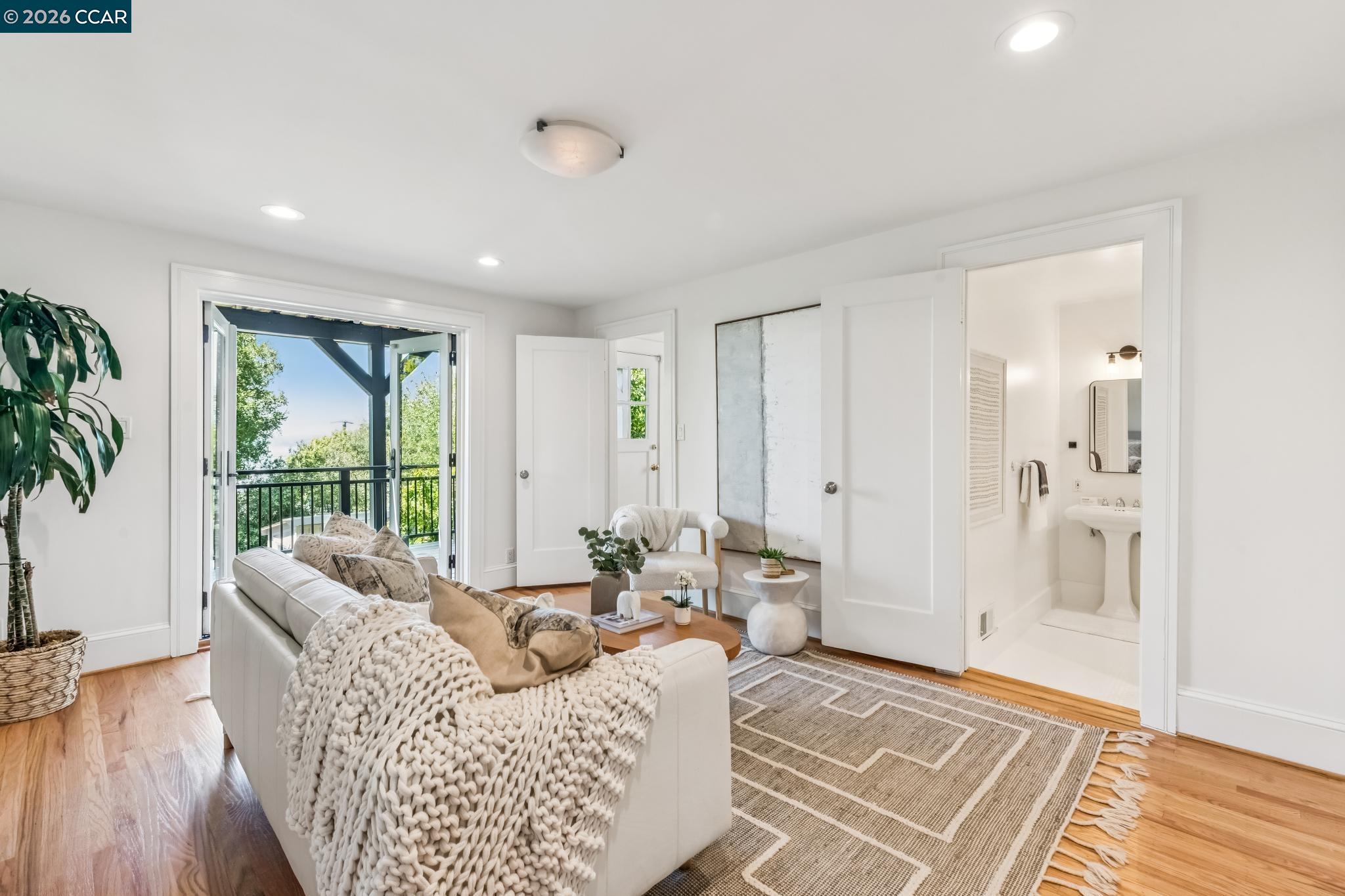 212 Yale Avenue Kensington, CA 94708 - Photo 34 of 70 a living room with furniture and a window