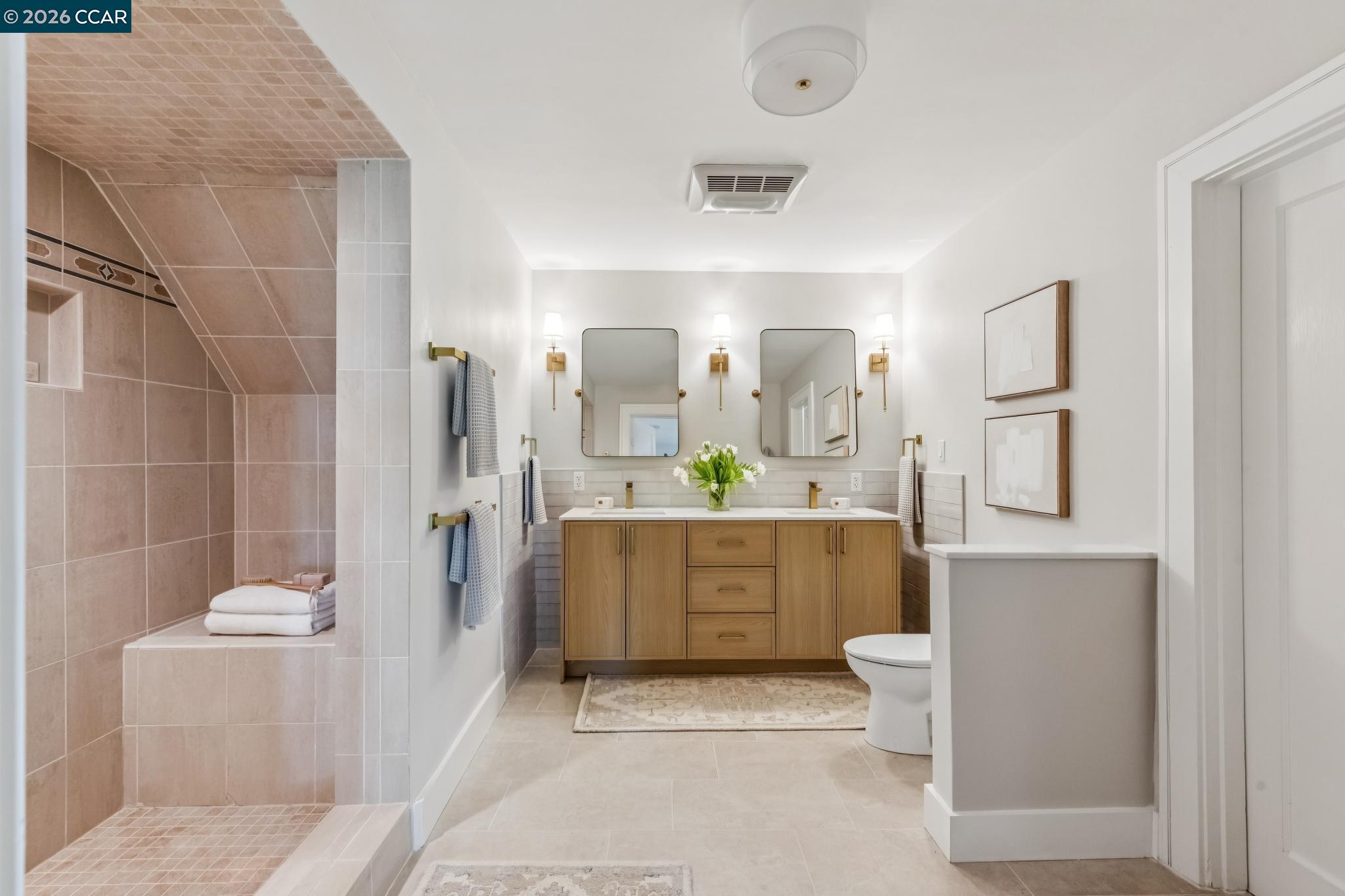 212 Yale Avenue Kensington, CA 94708 - Photo 40 of 70 a bathroom with a granite countertop sink a toilet and shower