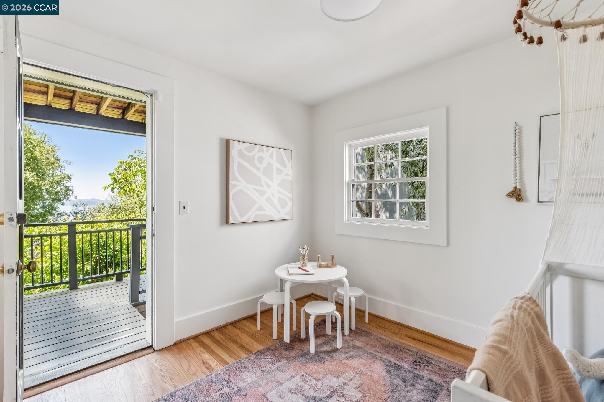 212 Yale Avenue Kensington, CA 94708 - Photo 44 of 70 a view of a livingroom with furniture window and wooden floor