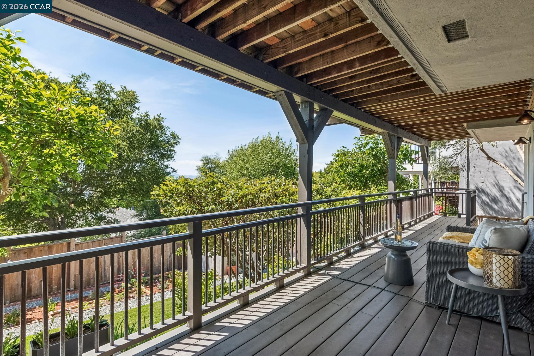 212 Yale Avenue Kensington, CA 94708 - Photo 45 of 70 a view of a balcony with chairs and wooden floor