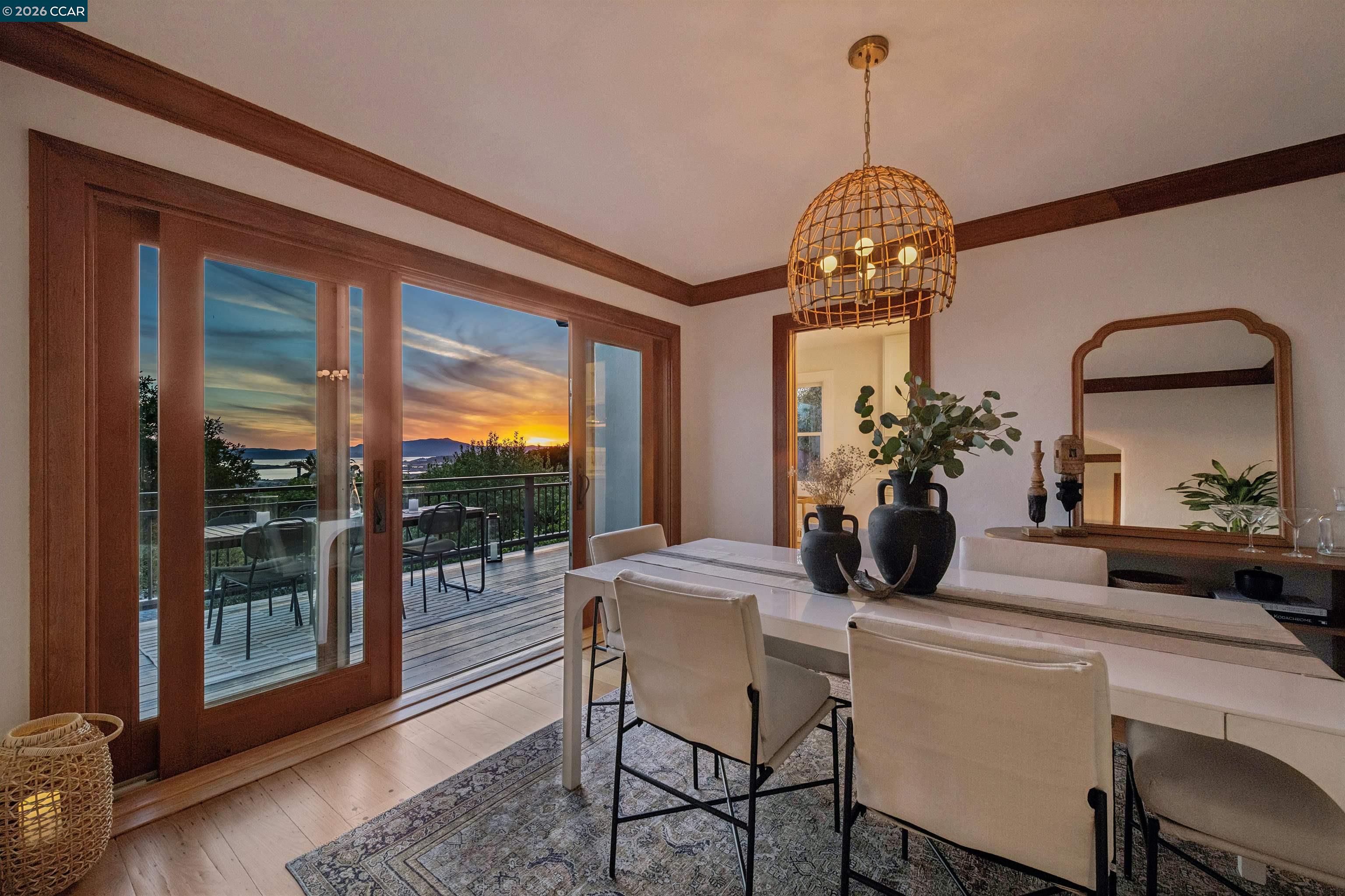 212 Yale Avenue Kensington, CA 94708 - Photo 58 of 70 a dining room with furniture a chandelier and window