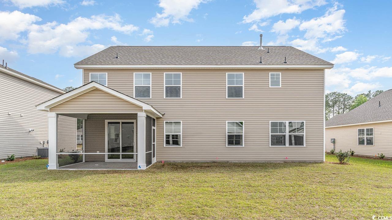 828 Hibernation Way Conway, SC 29526 - Photo 4 of 30 Rear view of property with a lawn