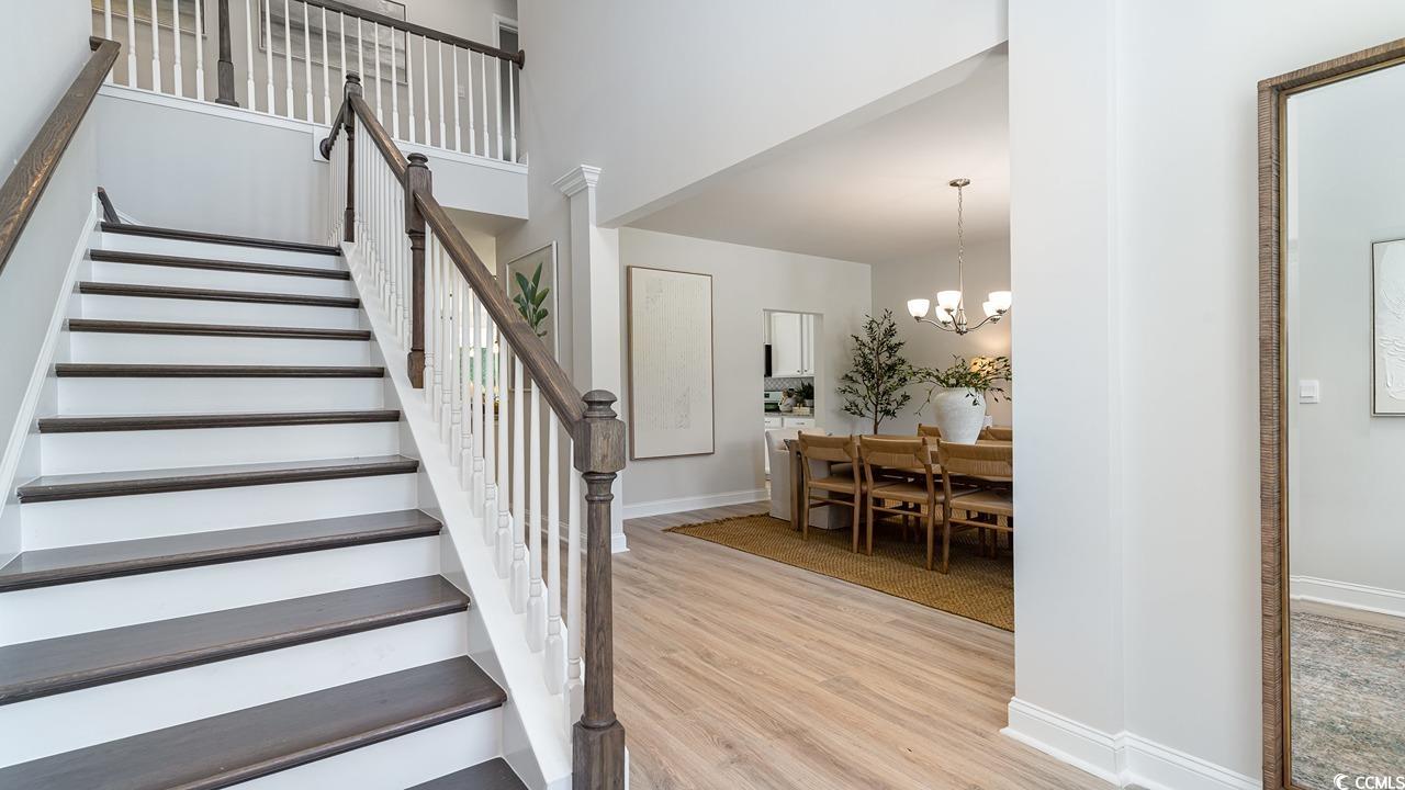 828 Hibernation Way Conway, SC 29526 - Photo 6 of 30 Stairs featuring hardwood / wood-style floors, a h