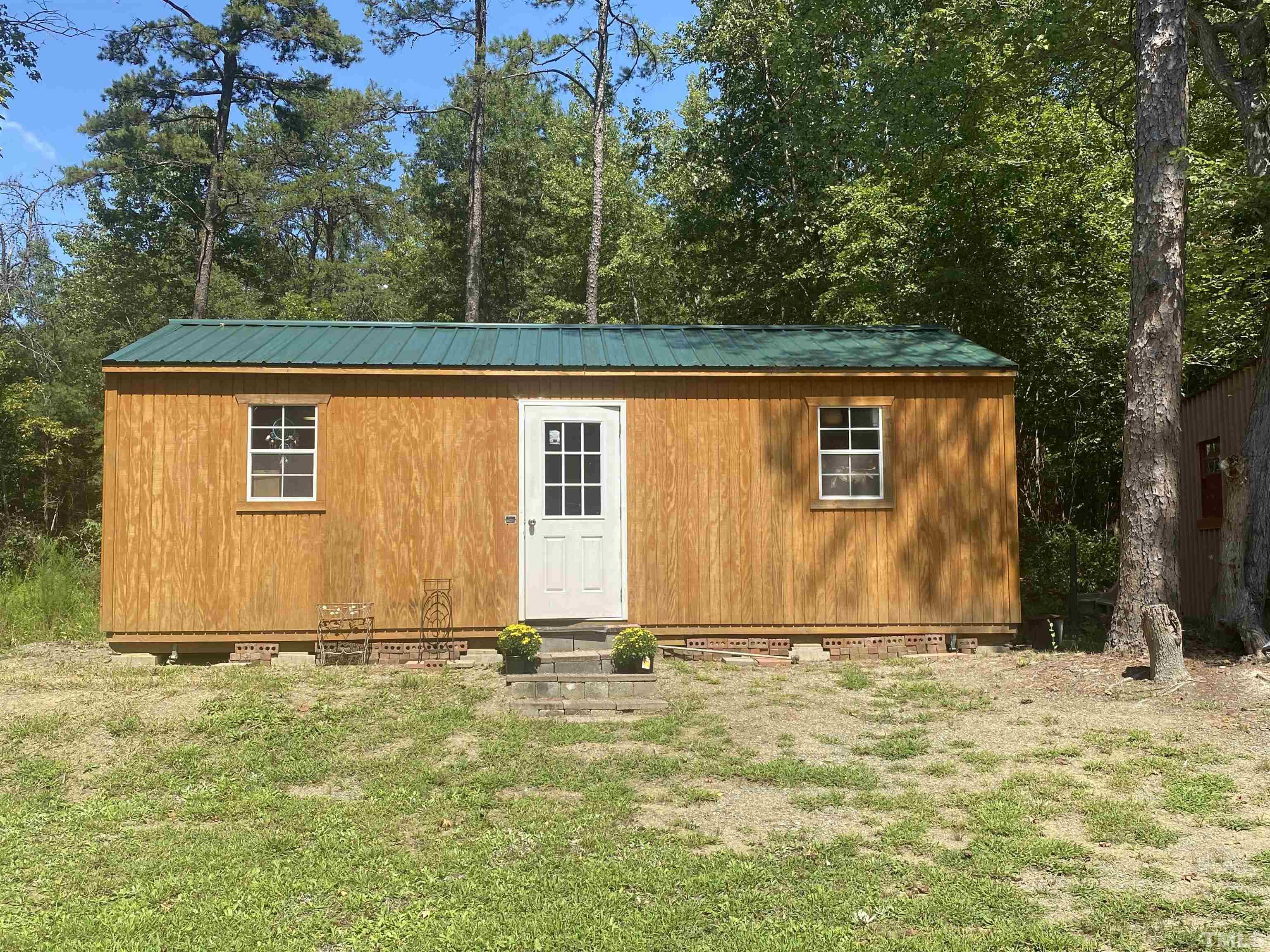 319 Cousin Road Rougemont, NC 27572 - Photo 15 of 17 a view of a backyard