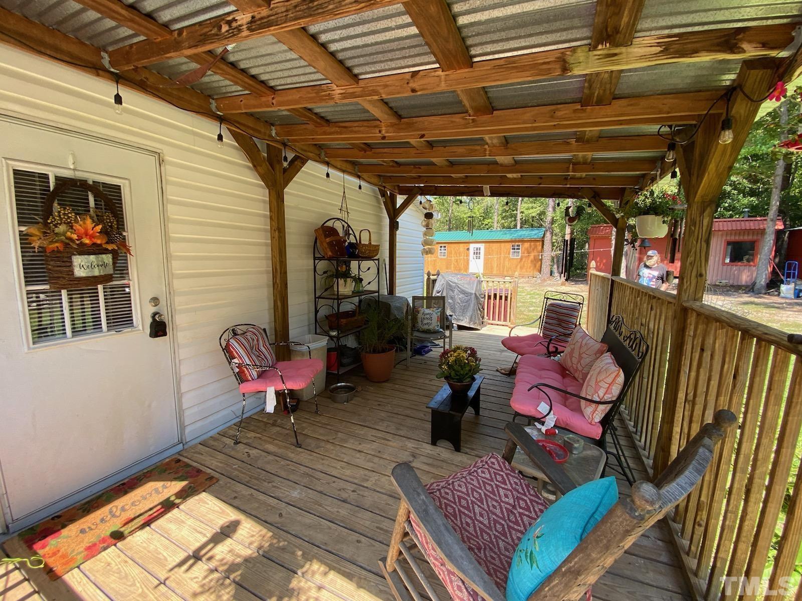 319 Cousin Road Rougemont, NC 27572 - Photo 3 of 17 a outdoor space with lots of furniture and a couch