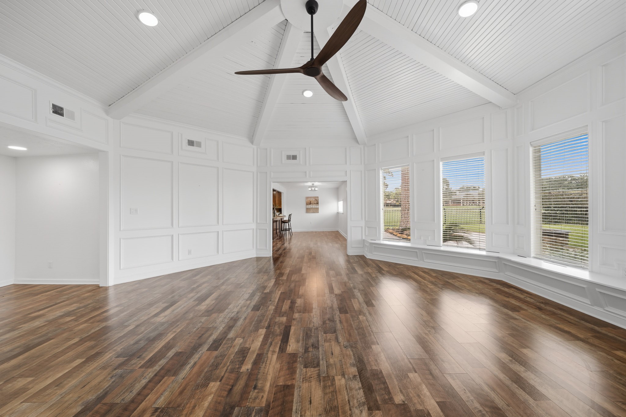 79 Summers Wind Street Conroe, TX 77356 - Photo 8 of 45 a view of empty room with wooden floor and fan