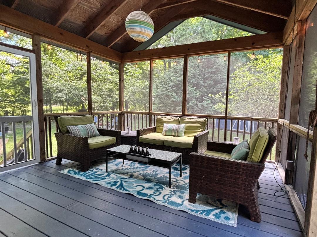 8702 Elm Valley Road Three Oaks, MI 49128 - Photo 9 of 17 screen porch