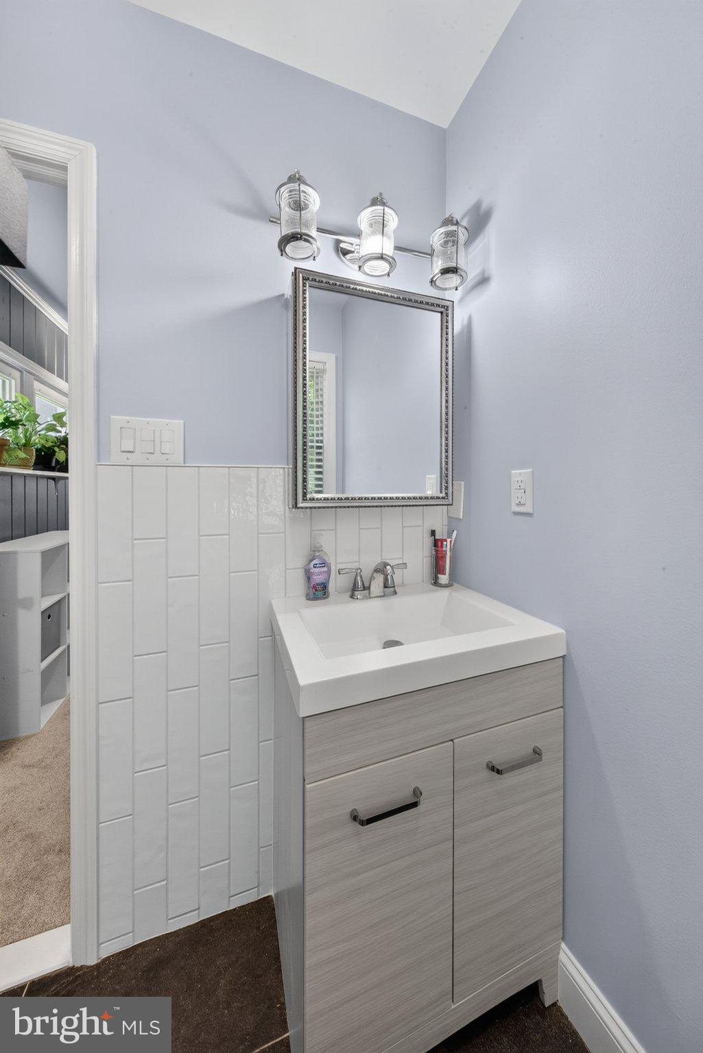 13 Harvard Road Wilmington, DE 19808 - Photo 35 of 45 Charming powder room with modern flair.