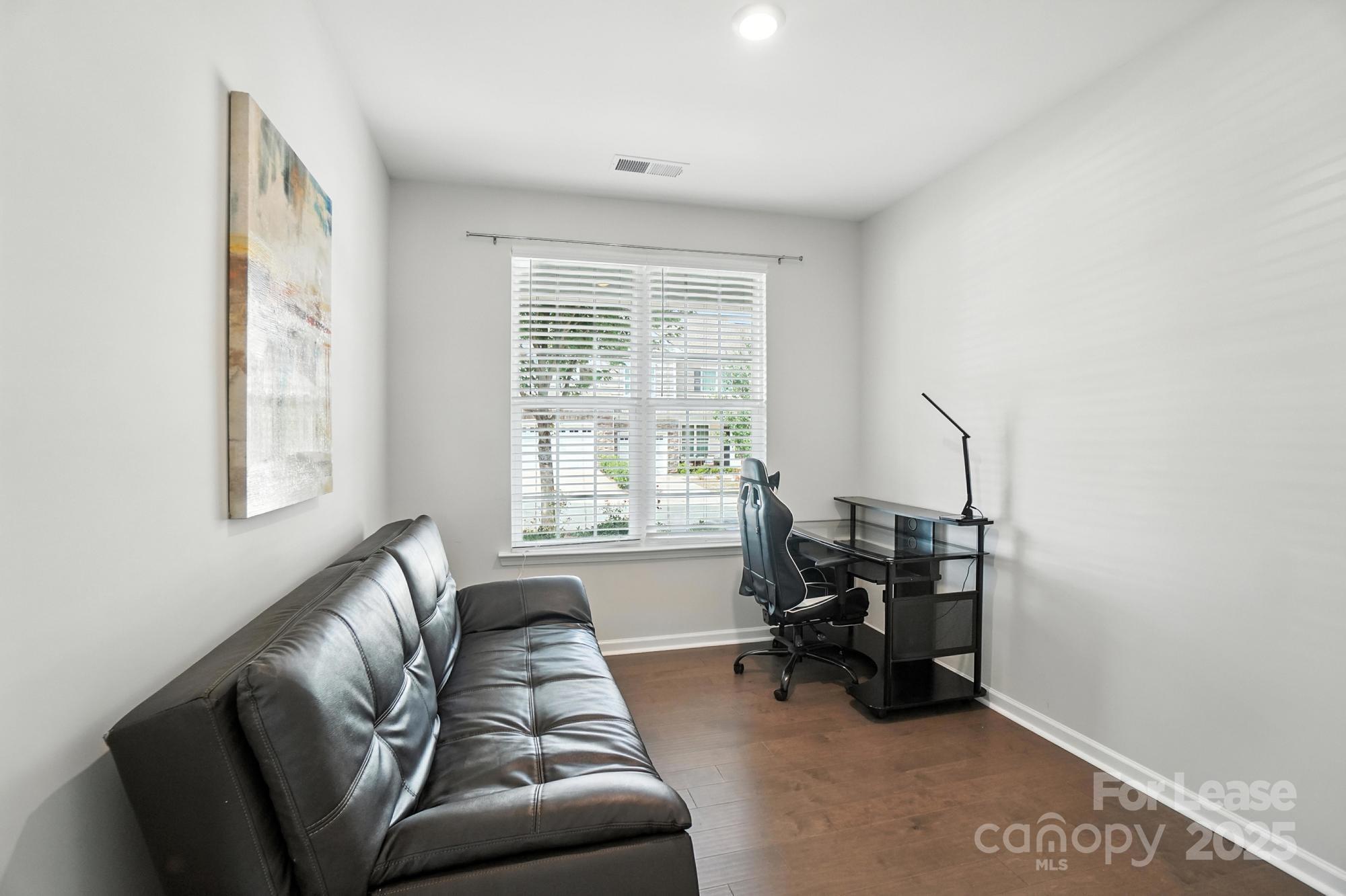 805 River Park Road Belmont, NC 28012 - Photo 16 of 42 a living room with furniture and a large window