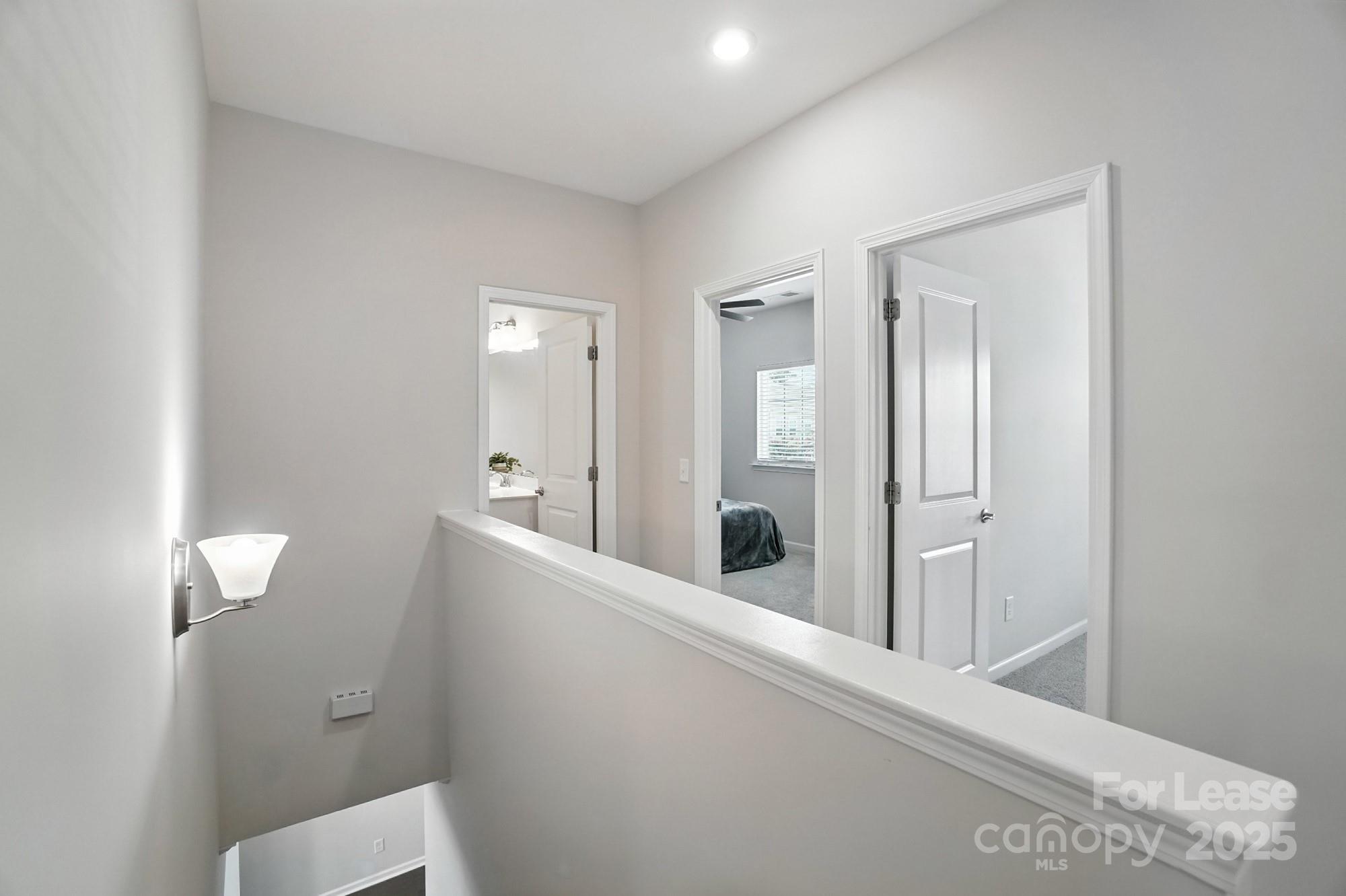805 River Park Road Belmont, NC 28012 - Photo 20 of 42 a bathroom with a sink and mirror with toilet