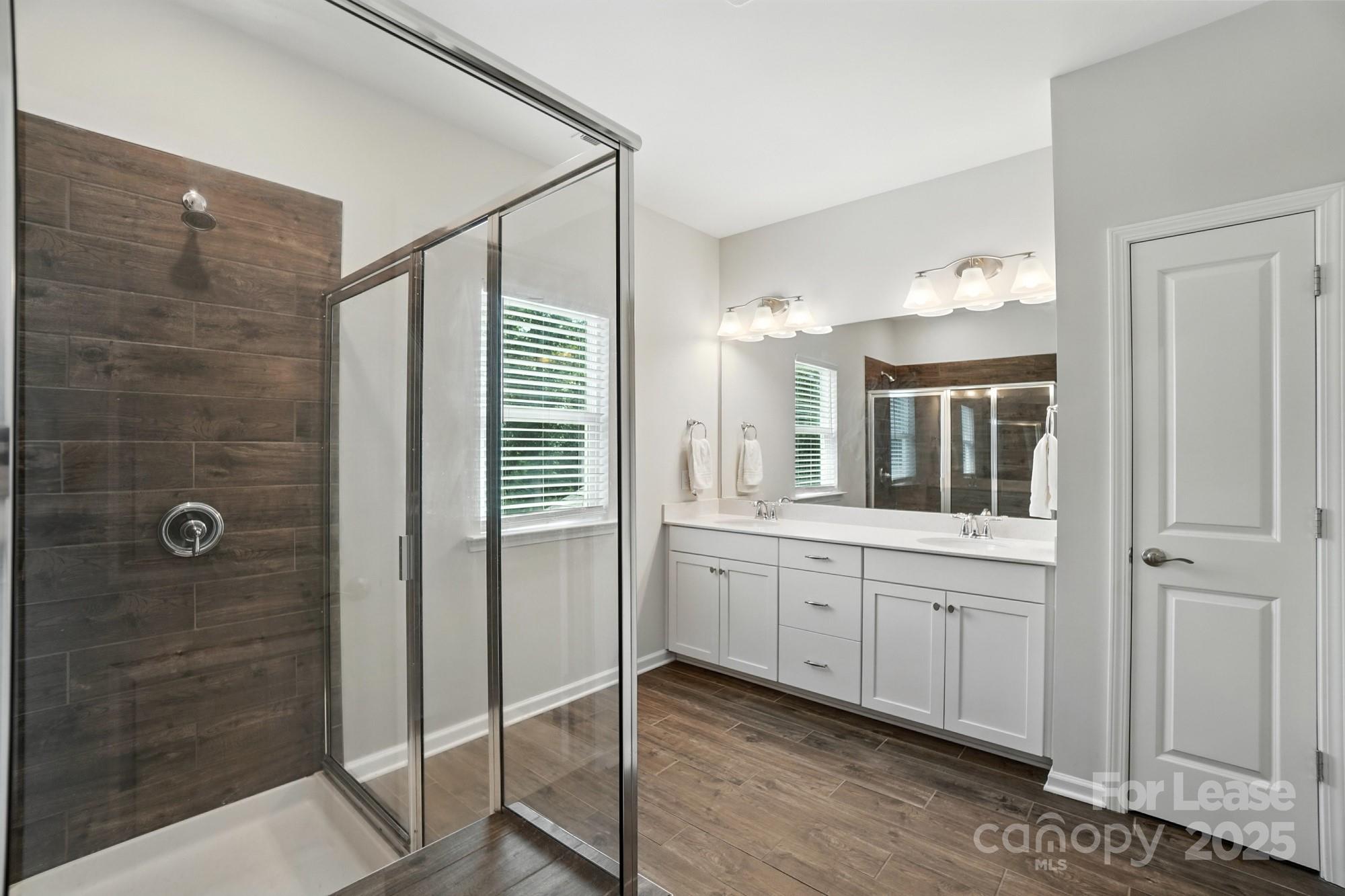 805 River Park Road Belmont, NC 28012 - Photo 25 of 42 a spacious bathroom with a shower and a sink