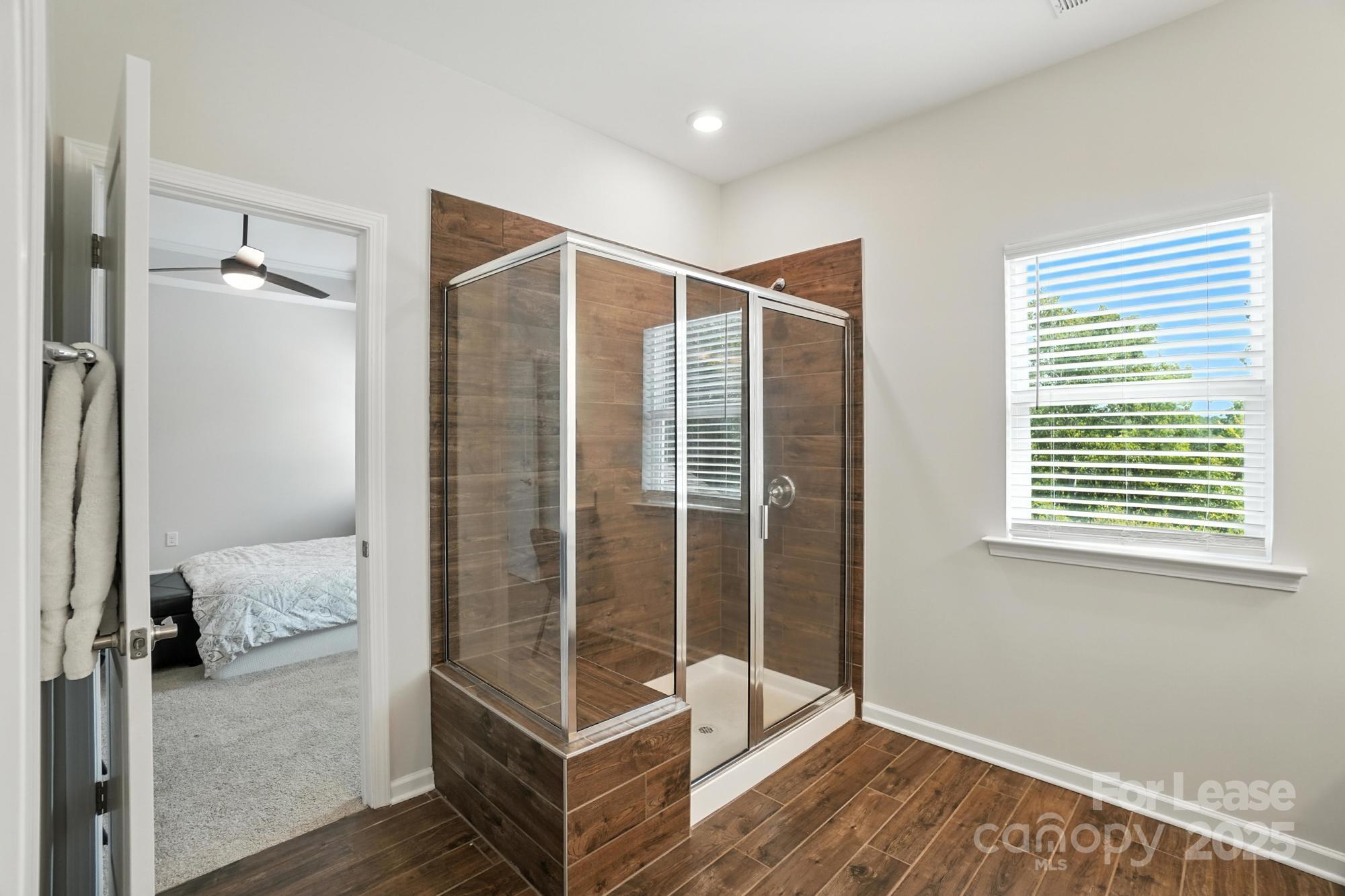 805 River Park Road Belmont, NC 28012 - Photo 27 of 42 a bathroom with a tub and shower