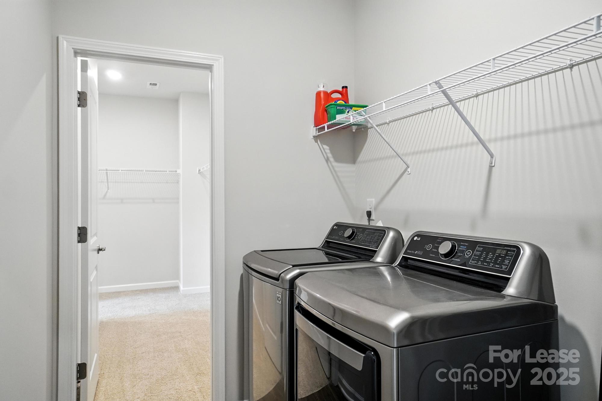 805 River Park Road Belmont, NC 28012 - Photo 32 of 42 a view of storage and utility room with racks on the wall