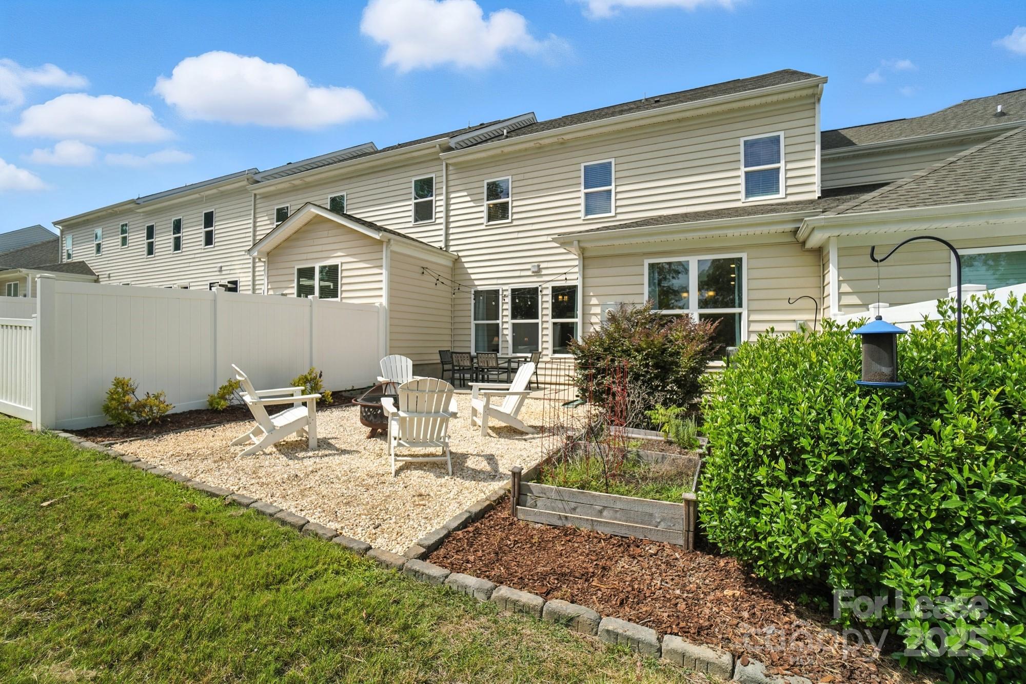 805 River Park Road Belmont, NC 28012 - Photo 38 of 42 a view of a house with backyard and sitting area