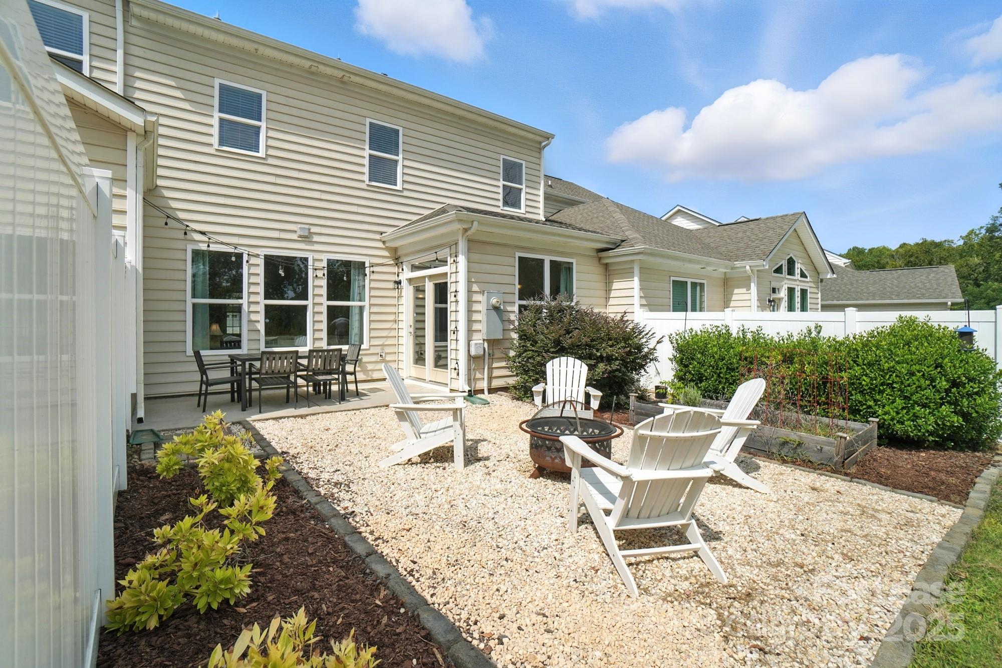 805 River Park Road Belmont, NC 28012 - Photo 39 of 42 a view of a house with backyard and sitting area