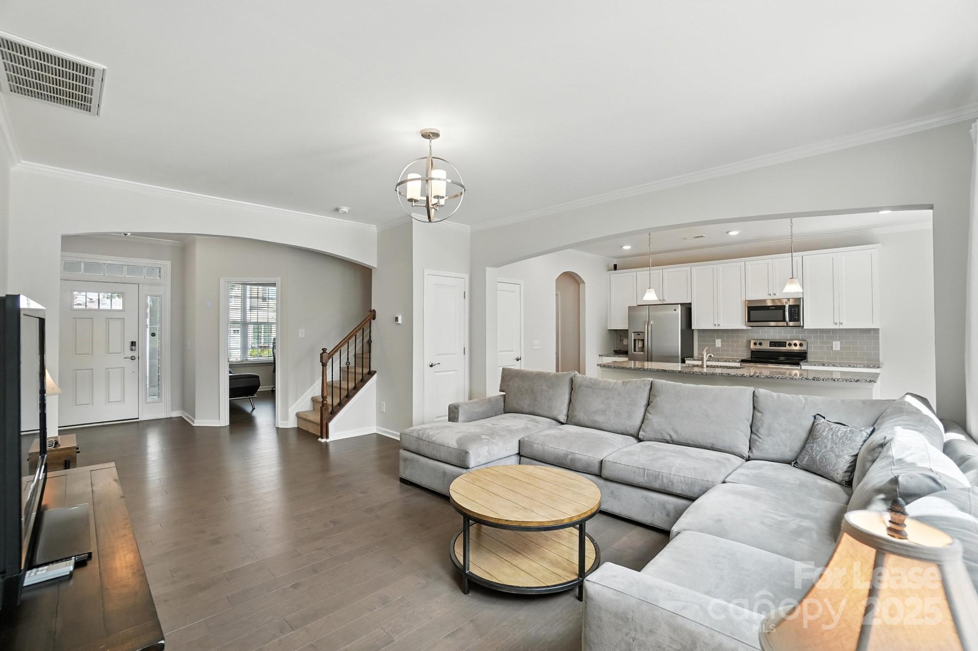 805 River Park Road Belmont, NC 28012 - Photo 5 of 42 a living room with furniture and wooden floor