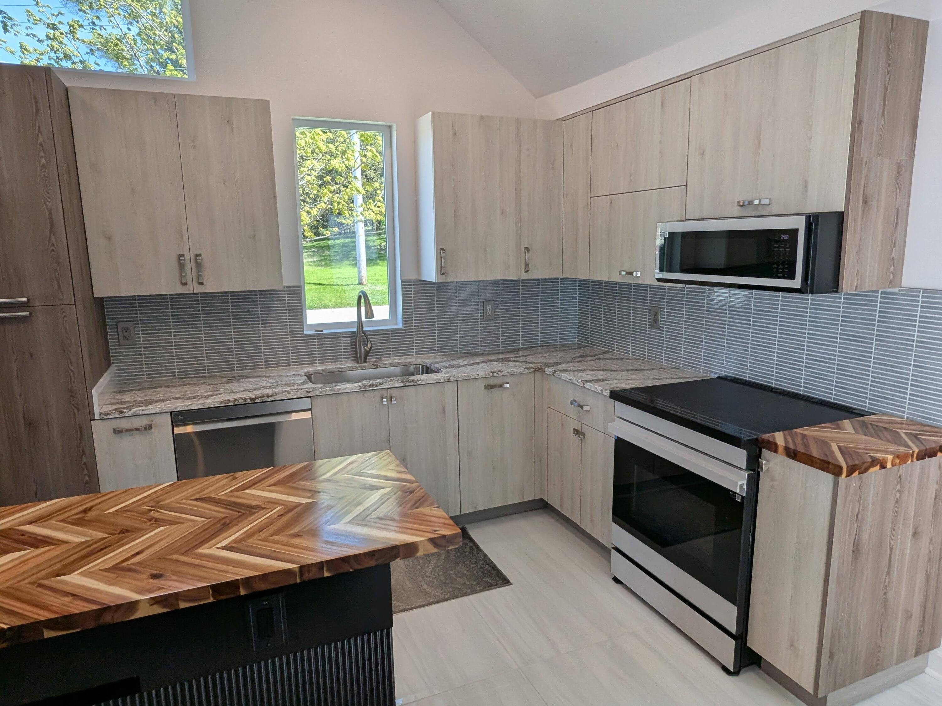 3298 Ridge Road Highland, IN 46322 - Photo 11 of 39 a kitchen with a stove and a microwave