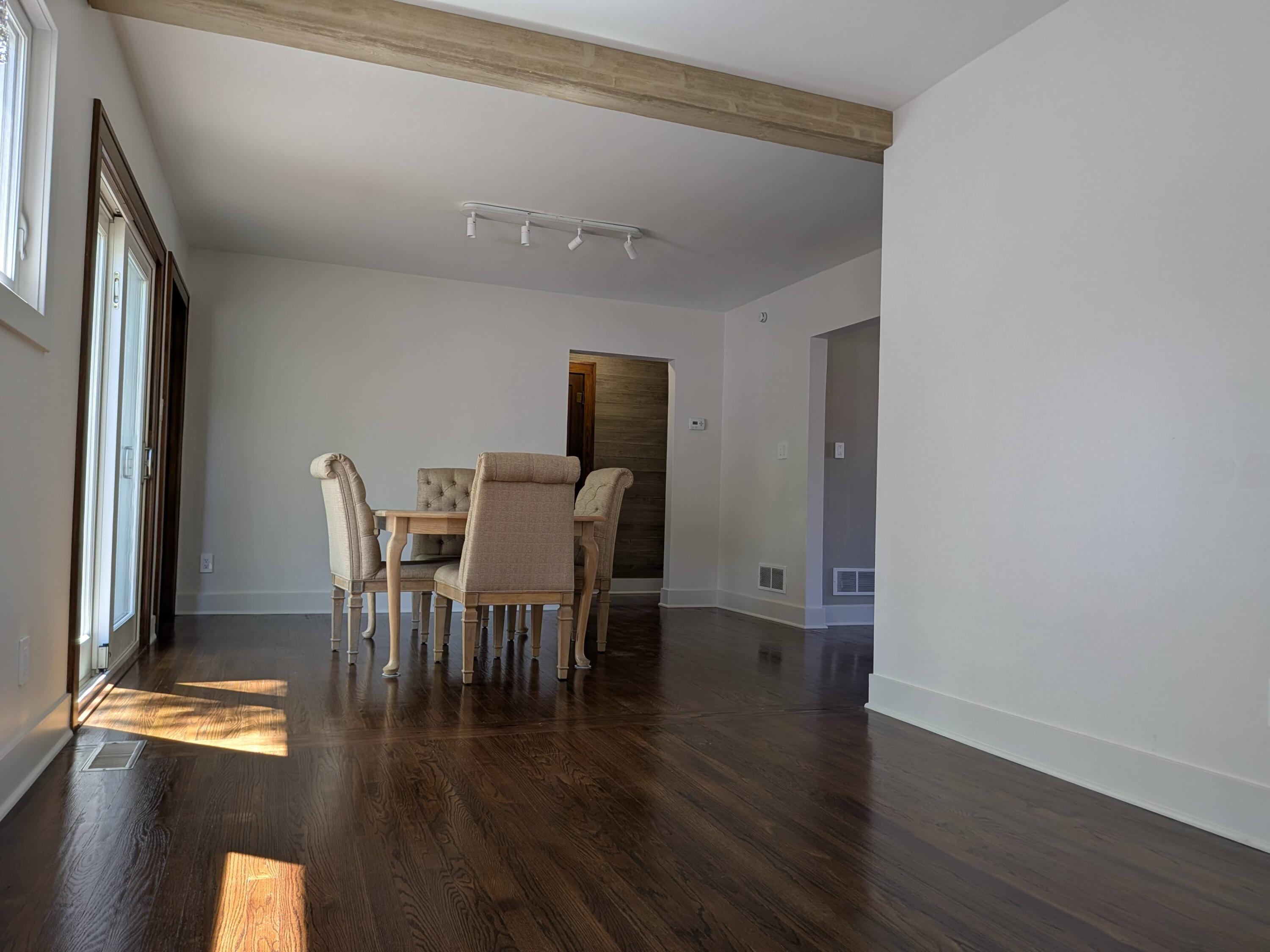 3298 Ridge Road Highland, IN 46322 - Photo 14 of 39 a view of a dining room with furniture and wooden floor