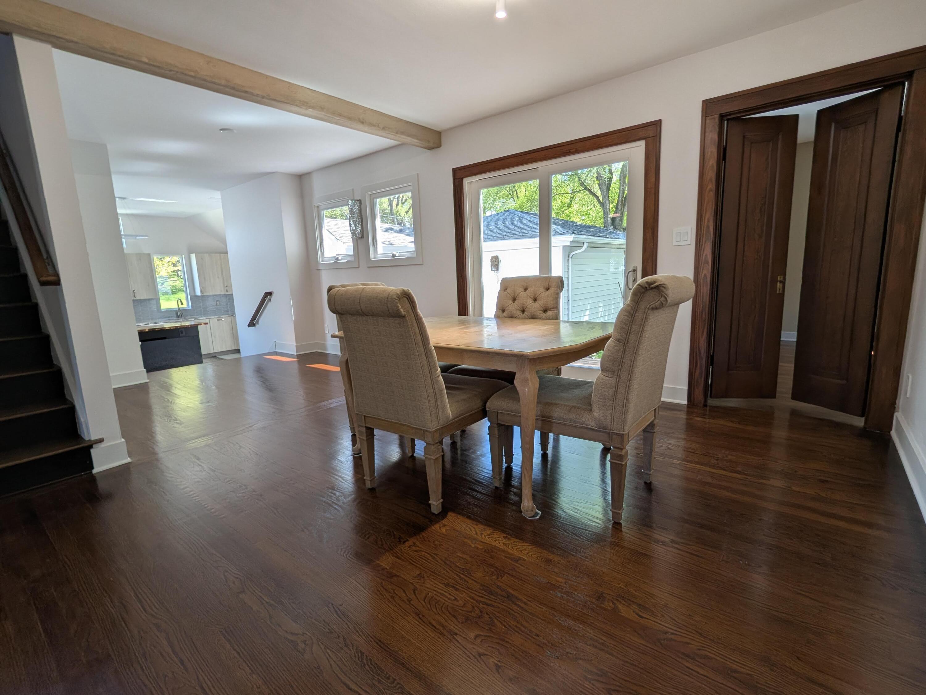 3298 Ridge Road Highland, IN 46322 - Photo 16 of 39 a view of a dining room with furniture and wooden floor