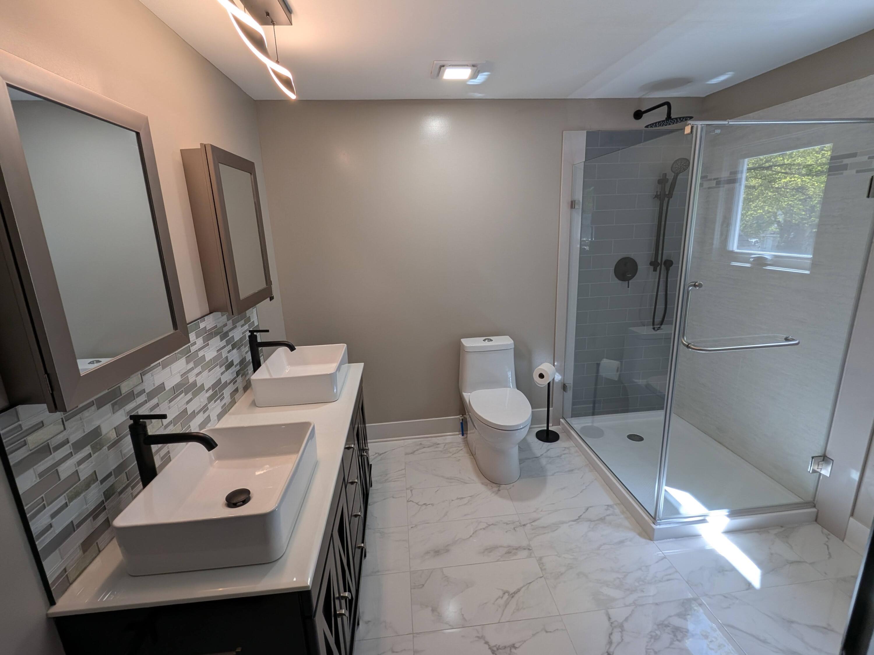 3298 Ridge Road Highland, IN 46322 - Photo 27 of 39 a bathroom with a sink a toilet and shower