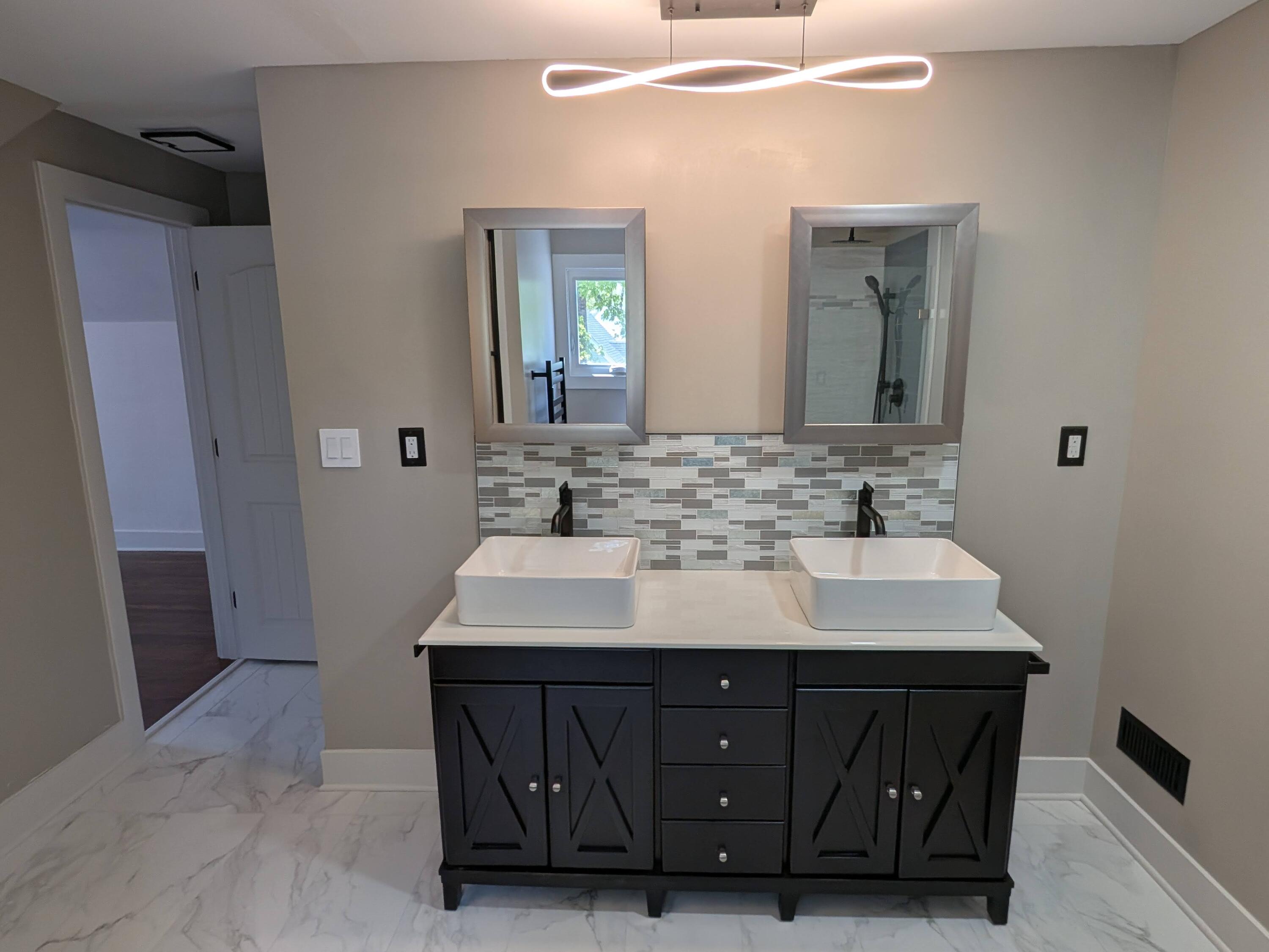 3298 Ridge Road Highland, IN 46322 - Photo 28 of 39 a bathroom with a sink vanity and a mirror