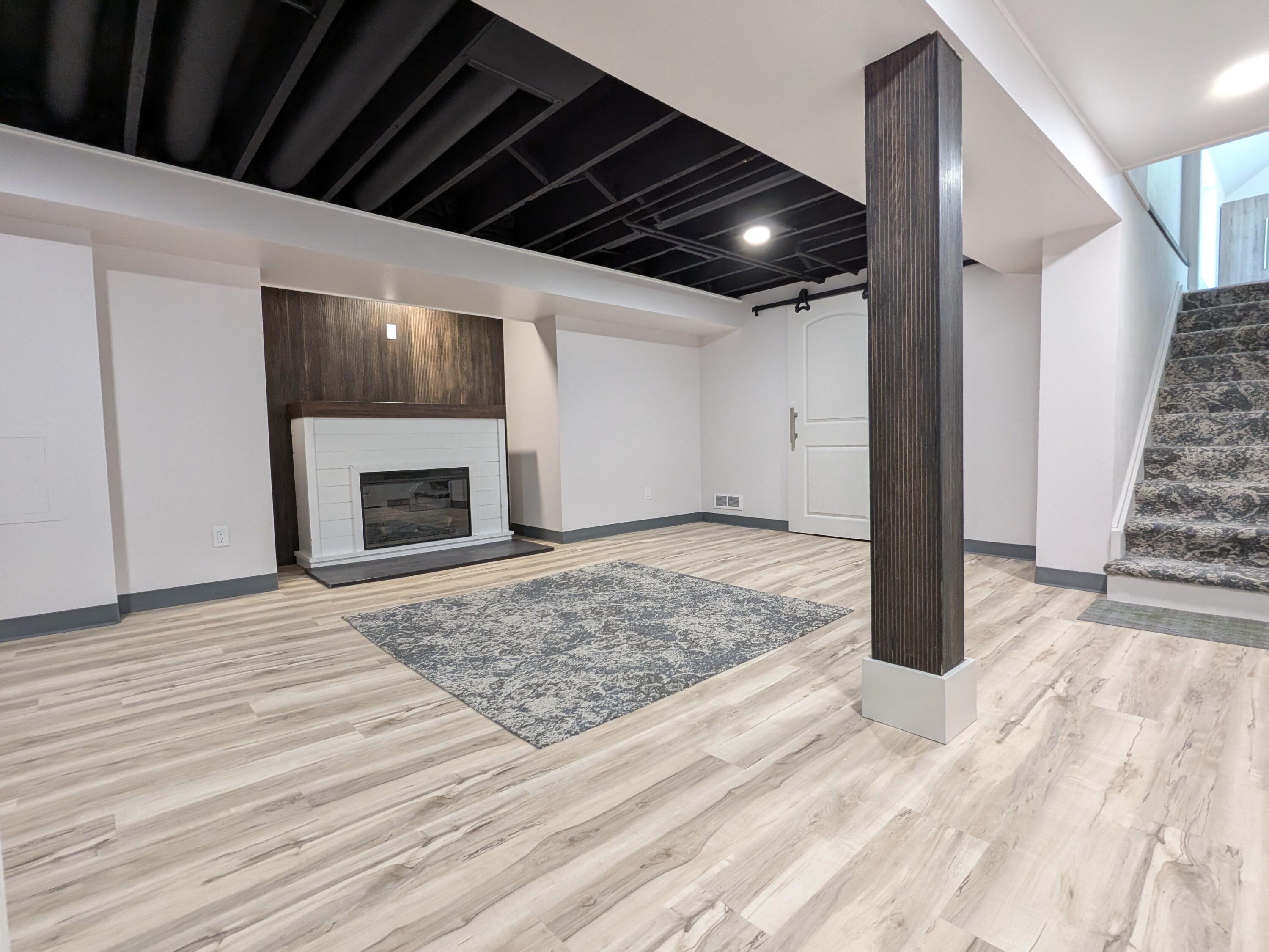 3298 Ridge Road Highland, IN 46322 - Photo 31 of 39 a view of empty room with wooden floor and fireplace