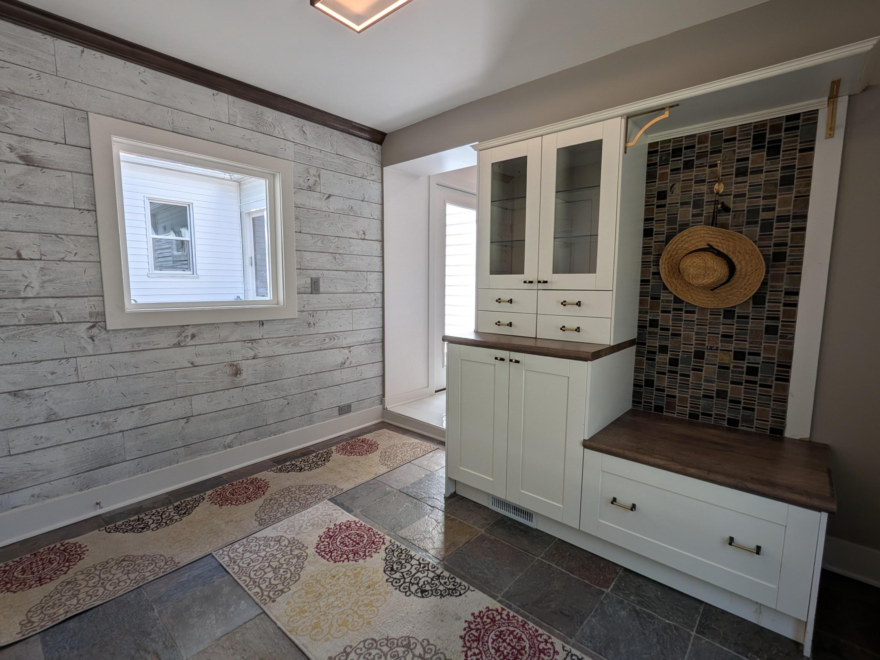 3298 Ridge Road Highland, IN 46322 - Photo 7 of 39 a bathroom with a sink and a mirror