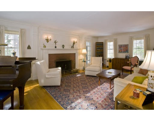54 Kirkstall Road Newton, MA 02460 - Photo 3 of 4 a living room with furniture and a fireplace