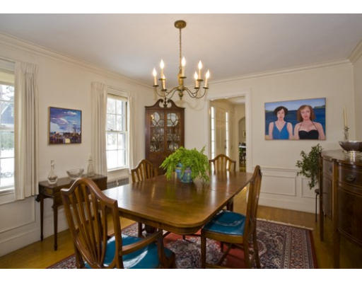 54 Kirkstall Road Newton, MA 02460 - Photo 4 of 4 a view of a dining room with furniture and a chandelier