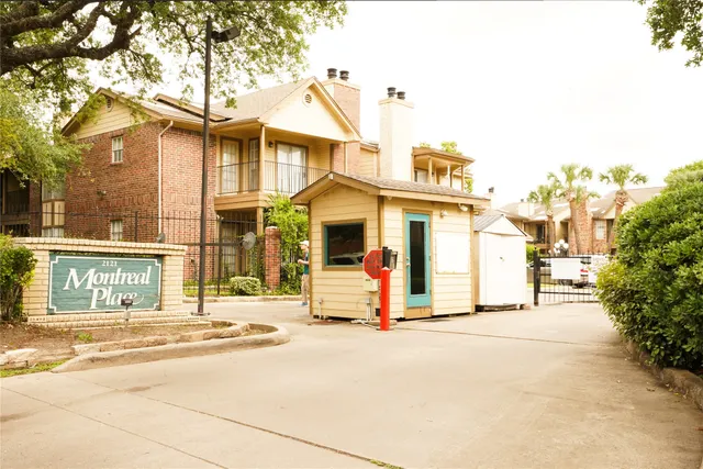 a front view of a building with a entrance to house