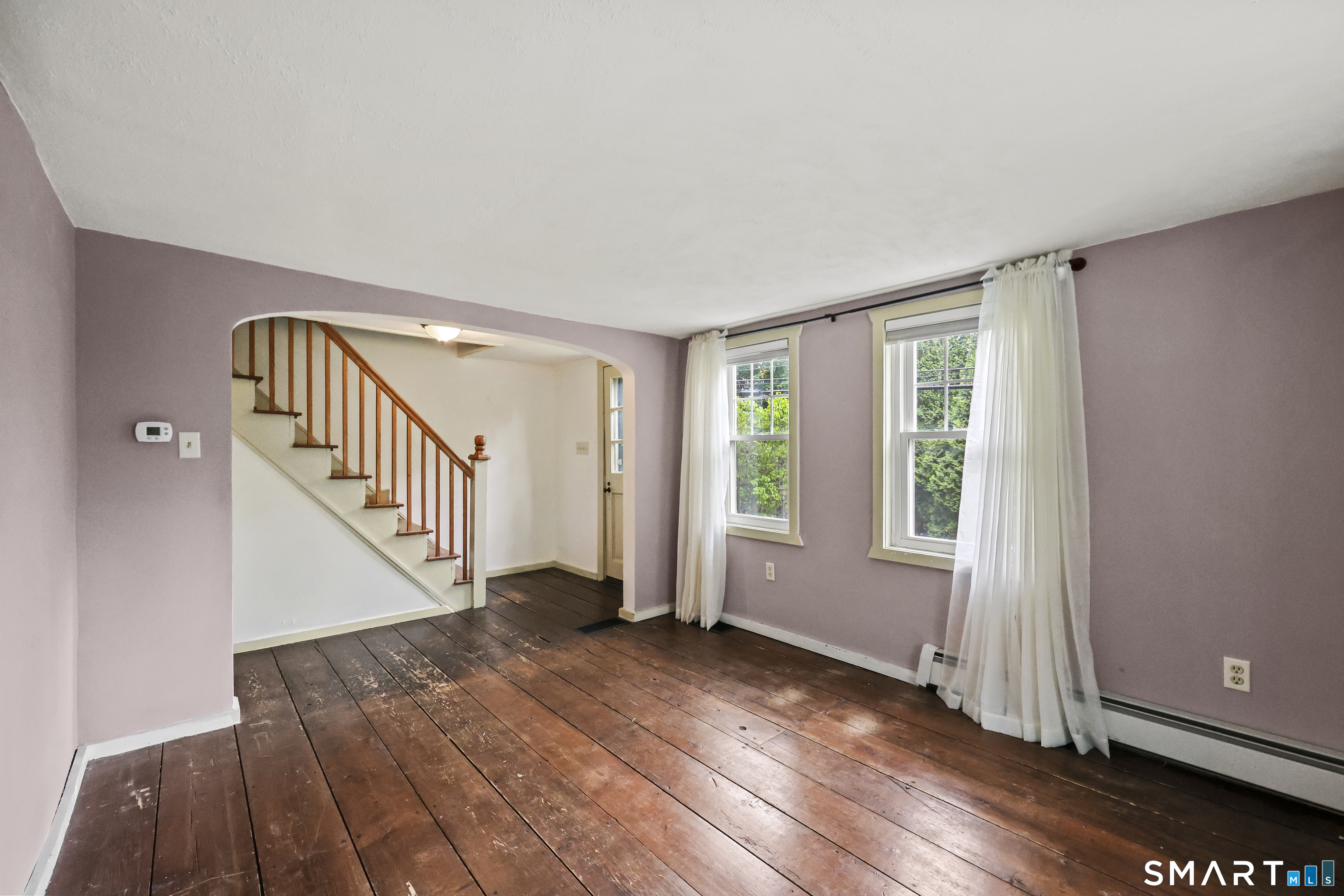 917 Hopewell Road Glastonbury, CT 06033 - Photo 13 of 39 wooden floor in an empty room with a window
